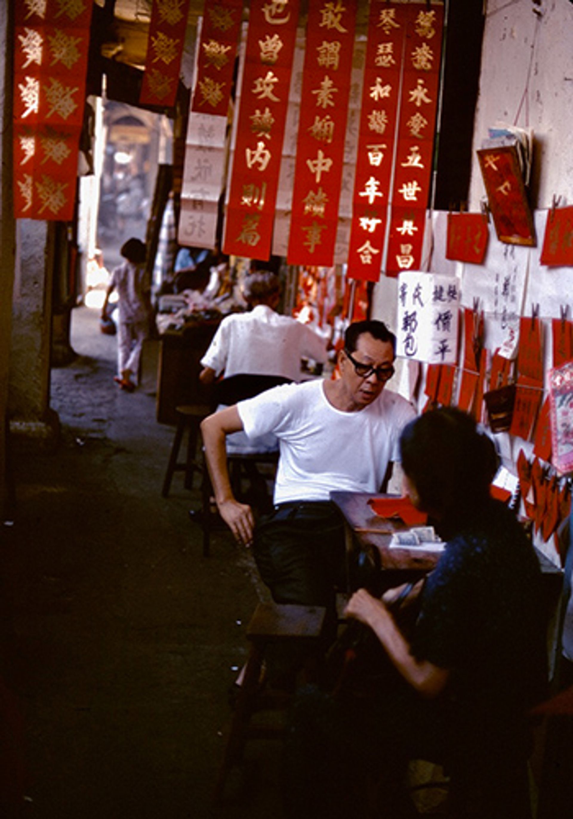 Before universal compulsory education, many Singaporeans were unable to read and write and depended on “letter writers” to help them with their correspondence. Photographed in the late 1970s in Chinatown.