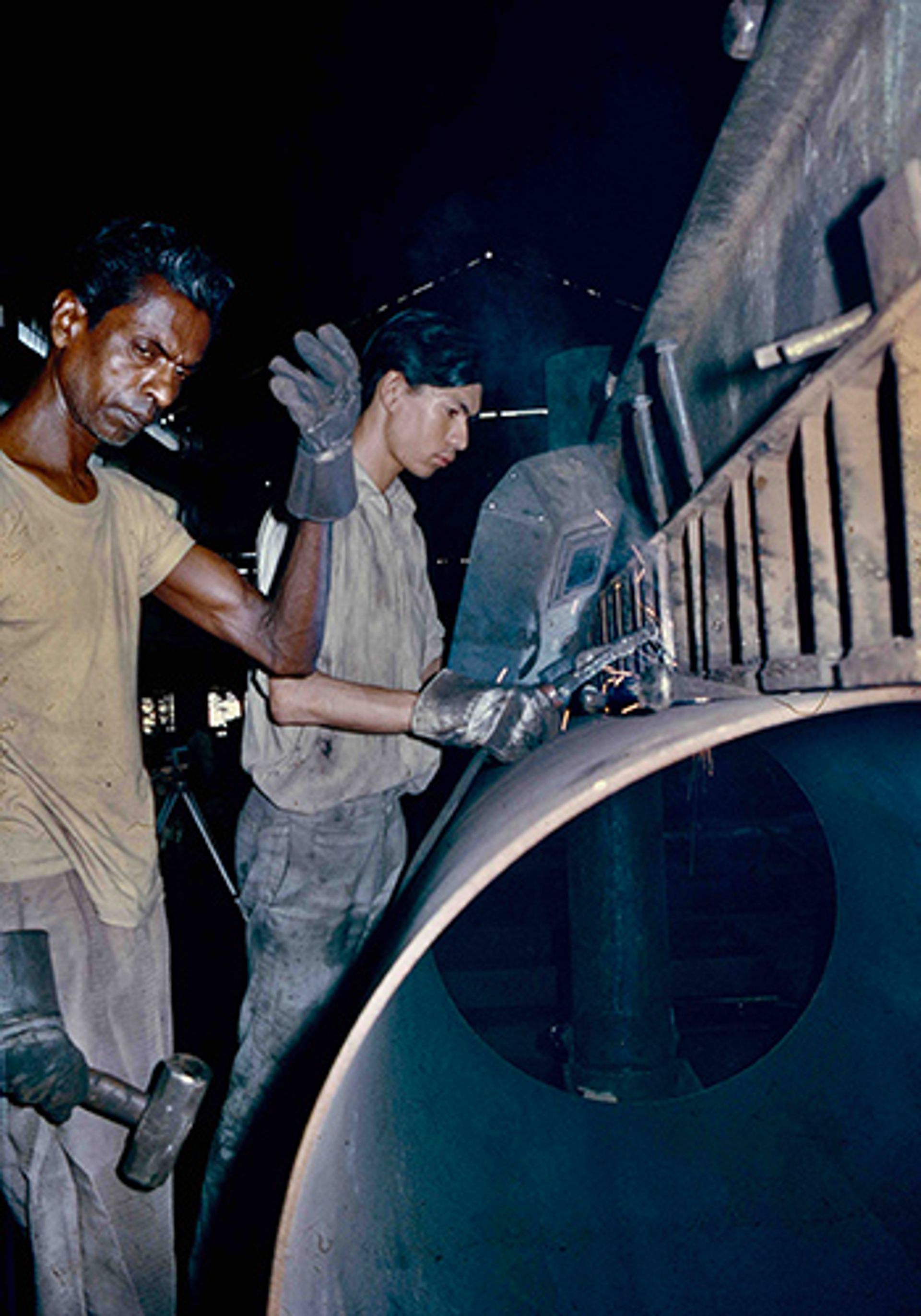 Two welders from Hume Industries at work, circa 1980.