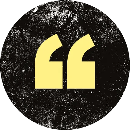 Yellow distressed double quotation marks on a black textured circle, symbolizing quotes or speech.