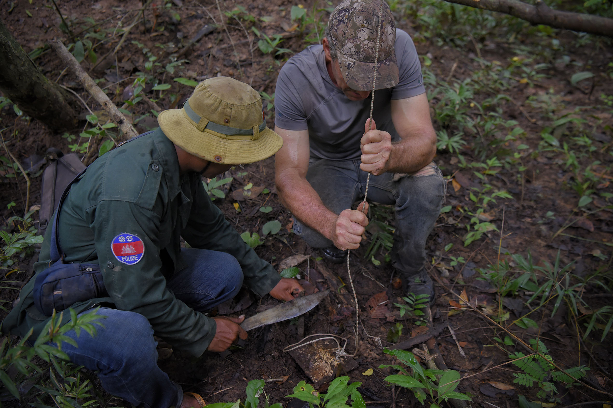 Rangers removing snares made of materials such as twine and twig from Cambodia’s Phnom Tnout Wildlife Sanctuary. ST PHOTO: MARK CHEONG