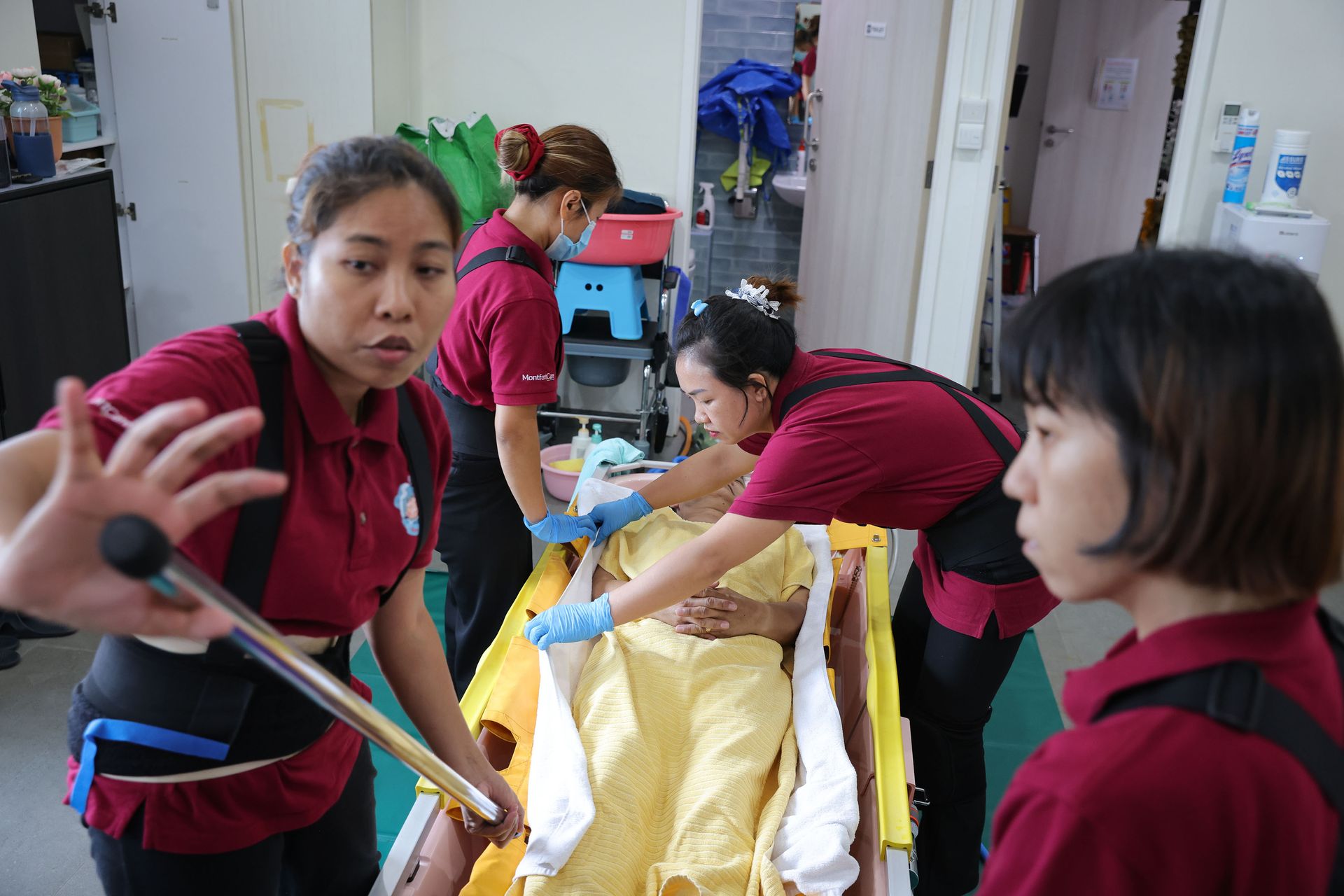 Ms Khaing Mar Lwin (left) is passionate about her job and wants to impart her skills to others.