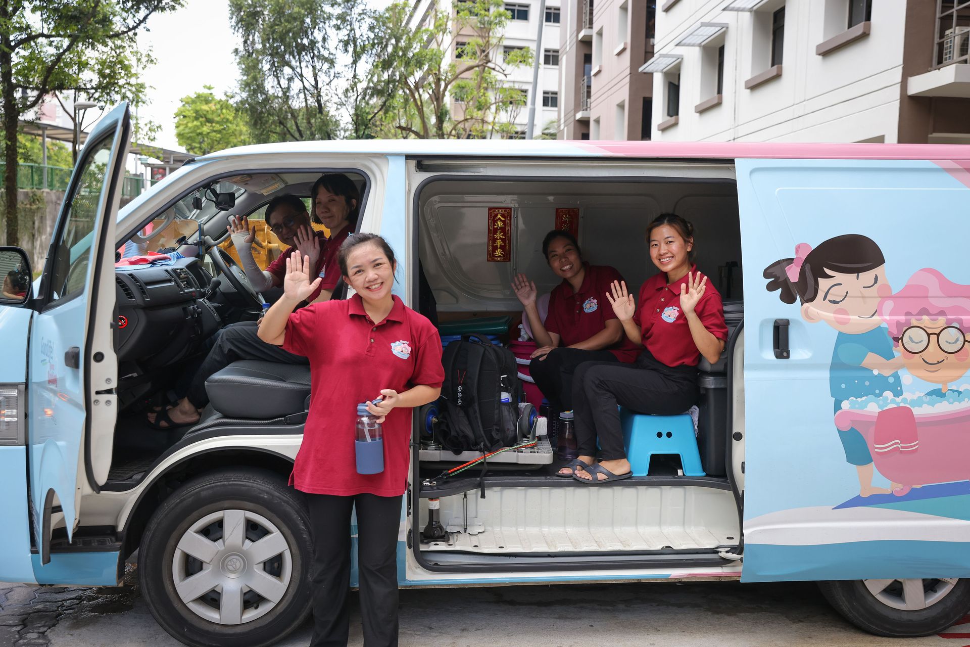Montfort Care’s home-bathing team about to leave Jurong West after completing Mr Lee’s bath.