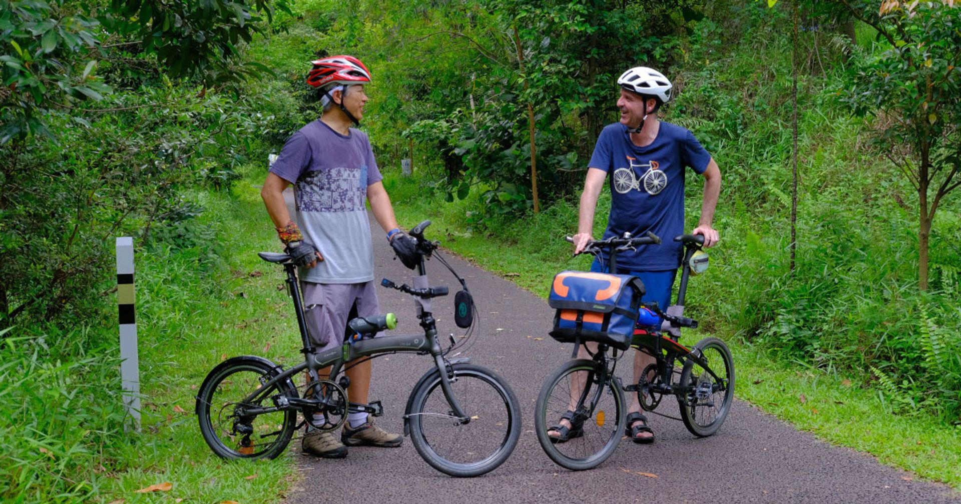 Han Jok Kwang and Stefan Gisin on a commute using the Rail Corridor.