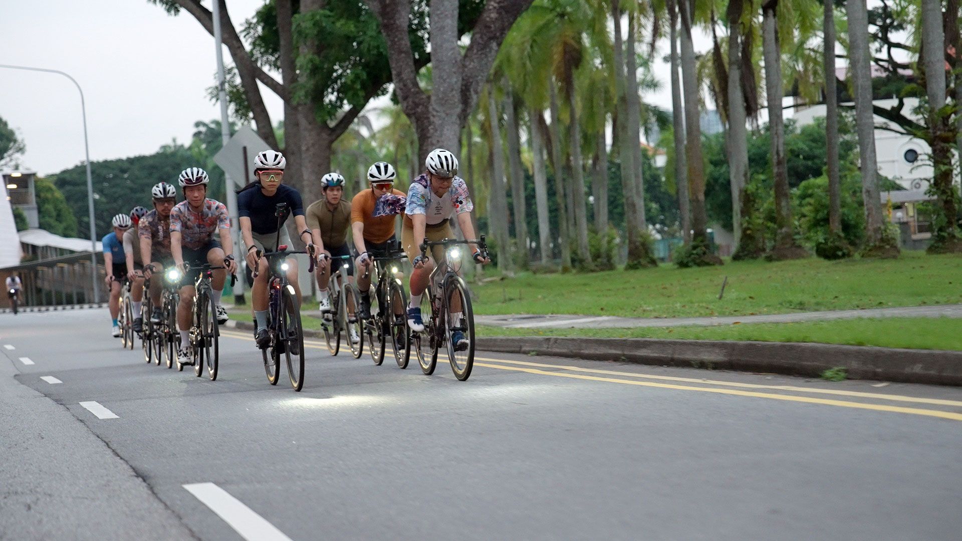 The members of Supper St. Cyclists start riding before dawn on Sundays to catch the sunrise over the city from Mount Faber.