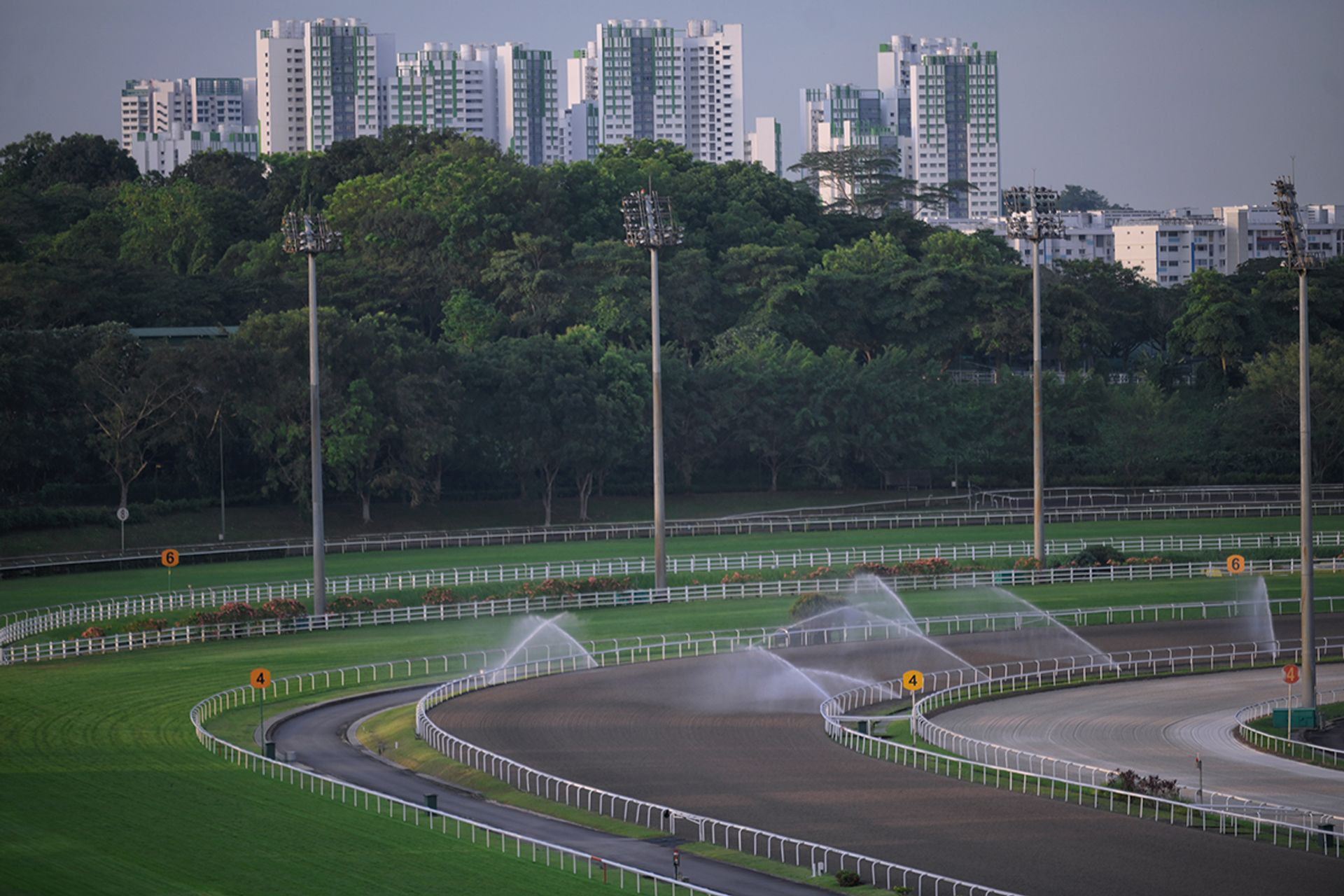 Sprinklers watering the racetrack at the Singapore Turf Club. ST PHOTO: MARK CHEONG