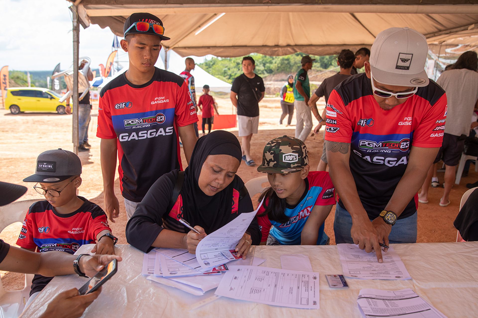 (From left) Iman, Ian, Ms Nasuha, Iris and Mr Fazlin at the MMC registration booth on July 7.