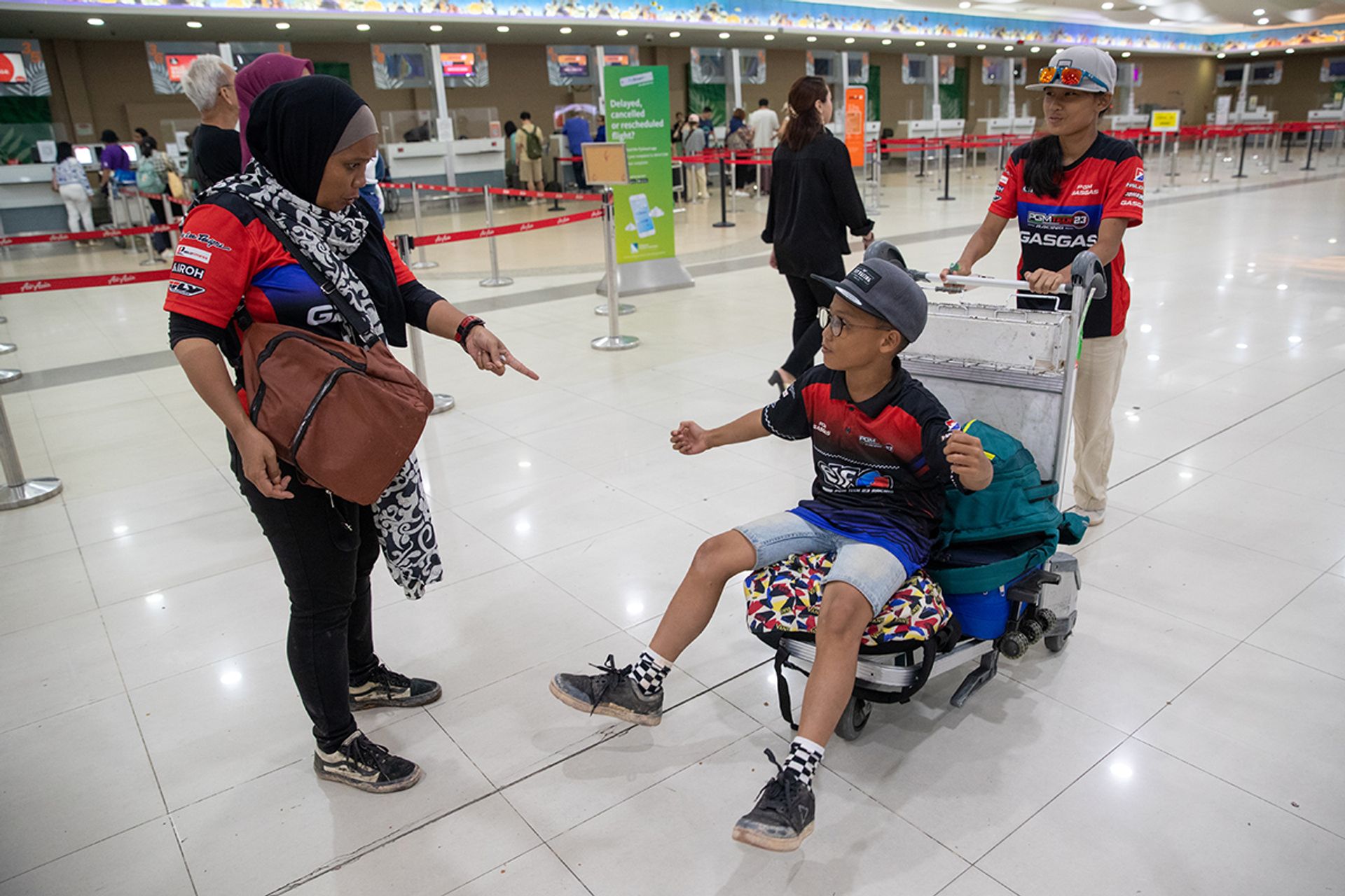 The family flying back to Singapore from Penang on July 9.