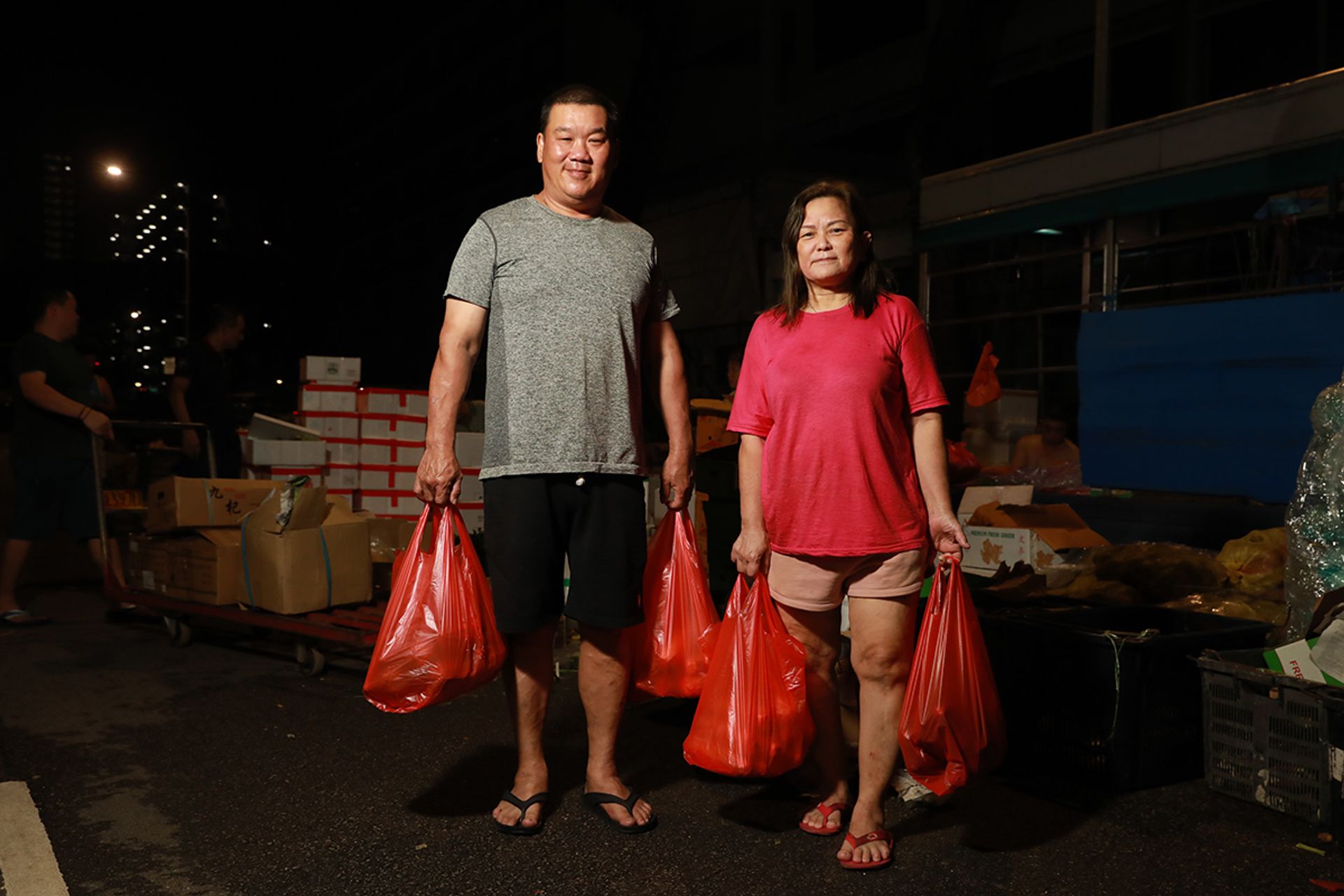 Mr David Po, 53, and his wife Yong Miau Eng, 57, run a yong tau foo stall in an industrial estate in Kaki Bukit. The couple have been buying vegetables for their stall from the night market since 2001, even before they were married. “We come here every day. Even rainy day, we also come,” said Mr Po.