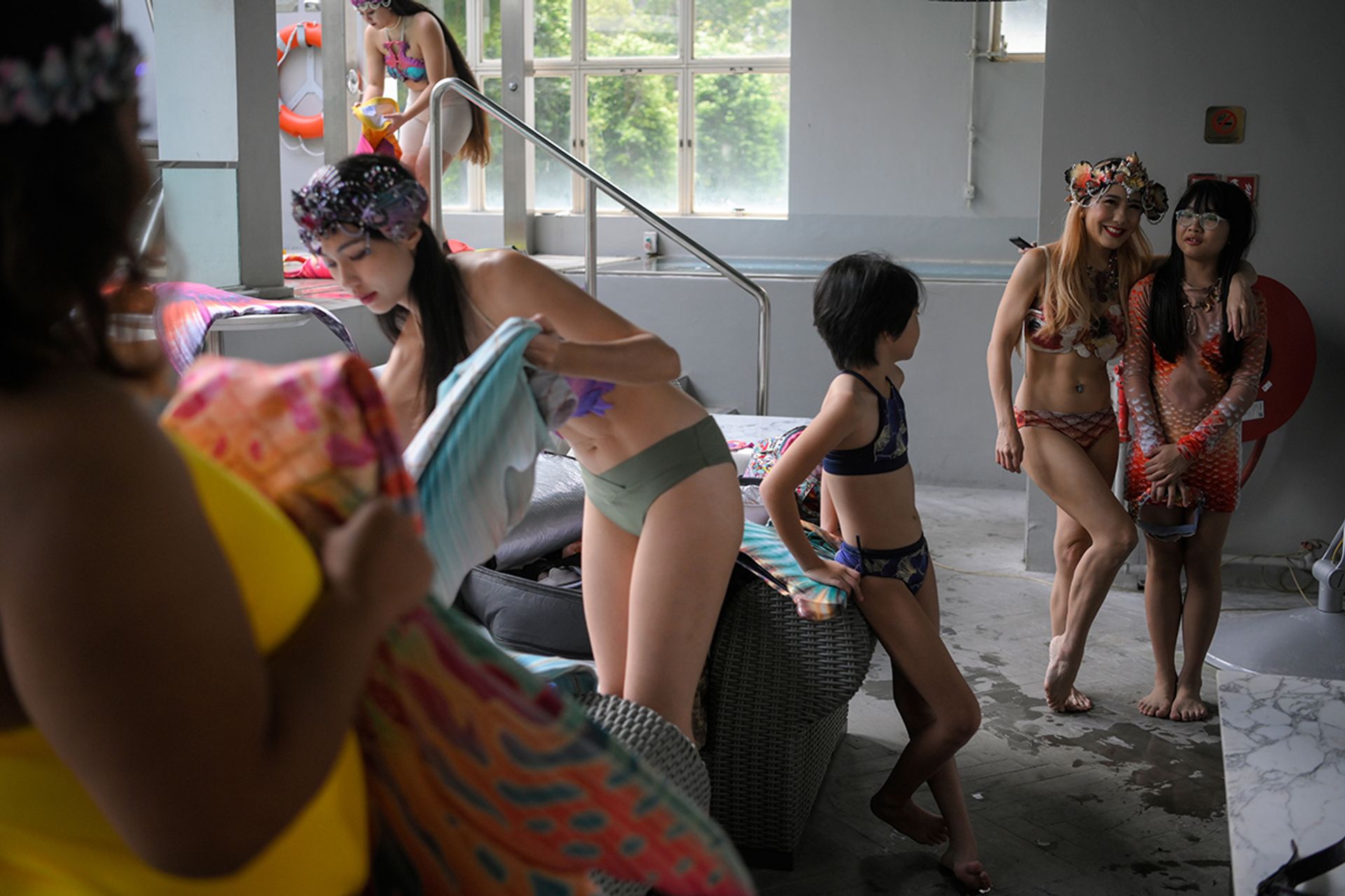 (Far right) Mother and daughter mermaid duo Stephanie Vanessa Co, 41, and Helena Sophie Ng, 11, photographed on July 30, 2023. ST PHOTO: MARK CHEONG