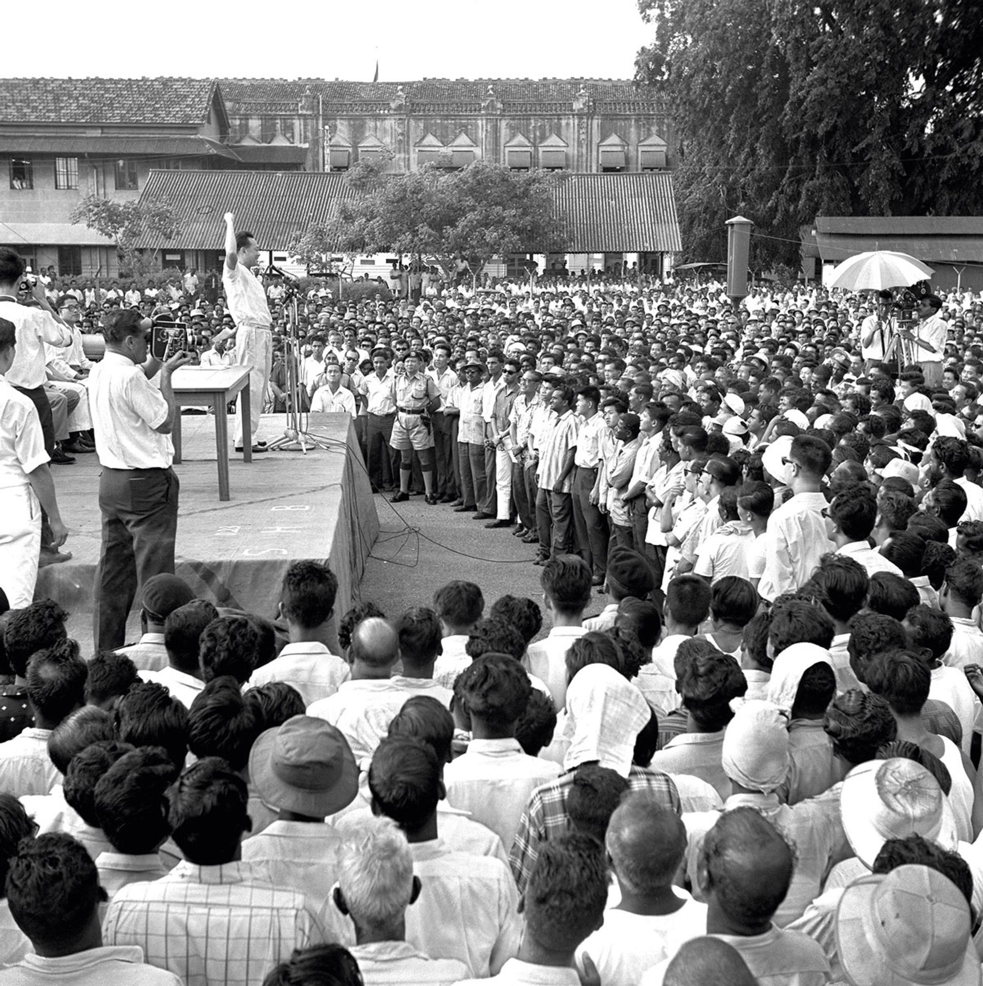 Mr Lee addressing Singapore Harbour Board Staff Association members at a vacant lot on July 22, 1963. He announced that he had deregistered the communist-influenced union after it decided to proceed with its strike despite his promise of a $2 million interim award for wage claims. He sought to free the unions from communist control to create a stable environment attractive to foreign investors. ST Photo: Han Hai Fong