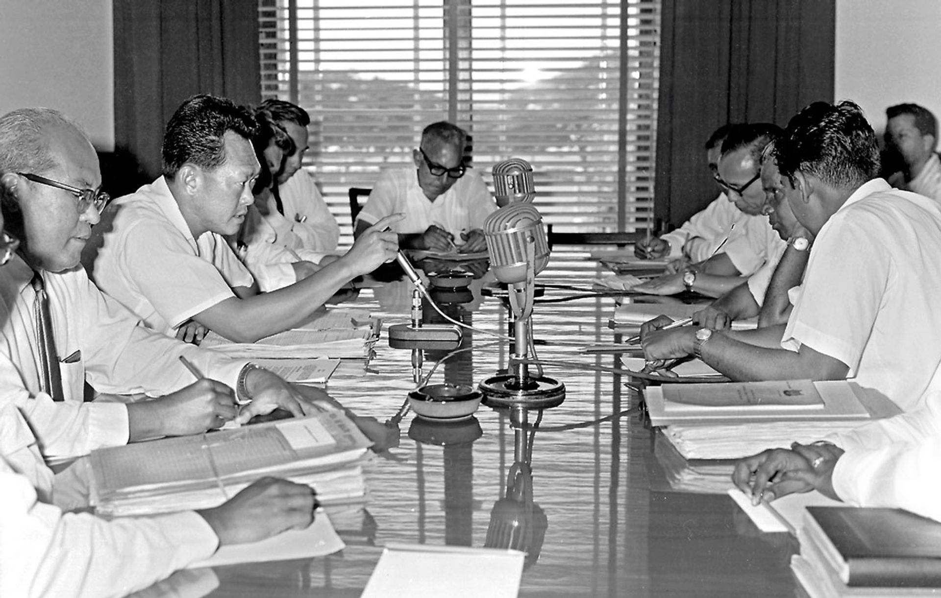 Mr Lee (second from left), seen here in a 1965 wage dispute meeting with leaders from two unions, continued to concern himself with workers’ issues after he became prime minister in 1959. But to lay the foundation for industrial peace, he introduced a law to restrict unions’ right to strike in 1968. Between July 1961 and September 1962, Singapore had a record 153 strikes. By 1969, for the first time since before the war, Singapore had no strikes or work stoppages. ST Photo: Low Yew Kong
