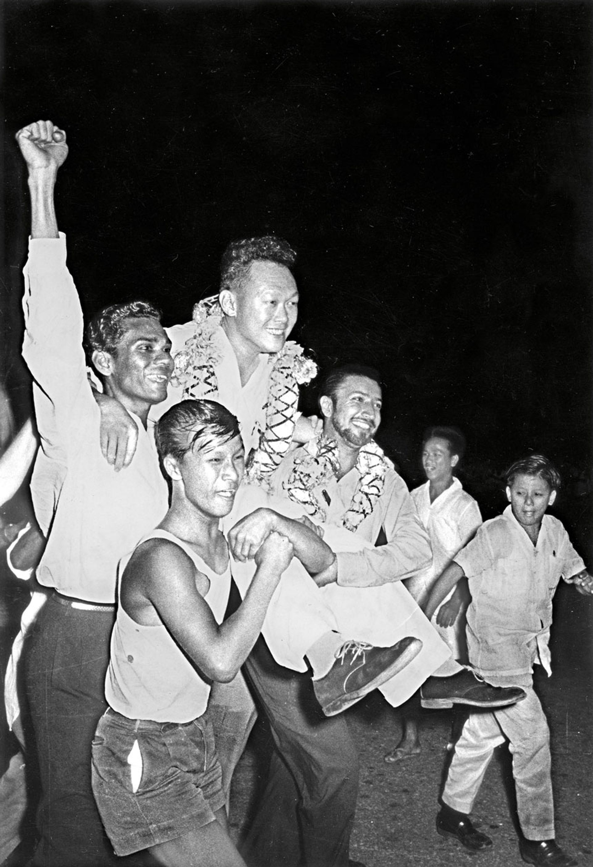 Jubilant supporters carrying a victorious Mr Lee after the People’s Action Party won 43 of 51 seats at the Legislative Assembly elections on May 30, 1959. Mr Lee would become Singapore’s first prime minister. Source: MCI Collection