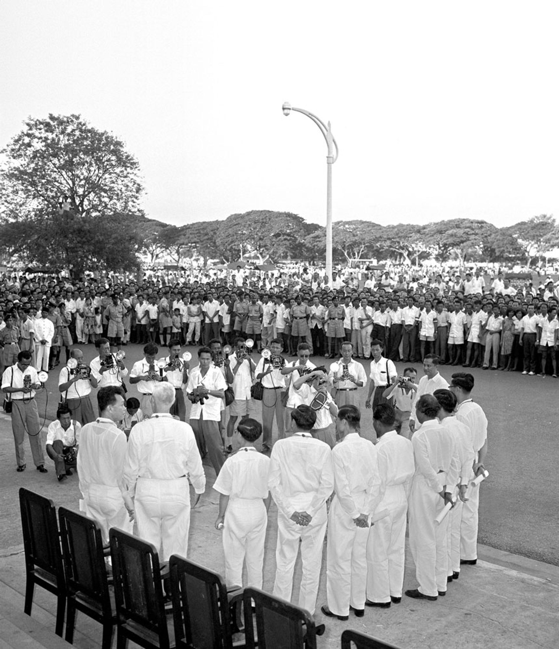 Mr Lee (foreground, left) and his first Cabinet ministers meeting the press after they were sworn in at City Hall on June 5, 1959. Source: The Straits Times