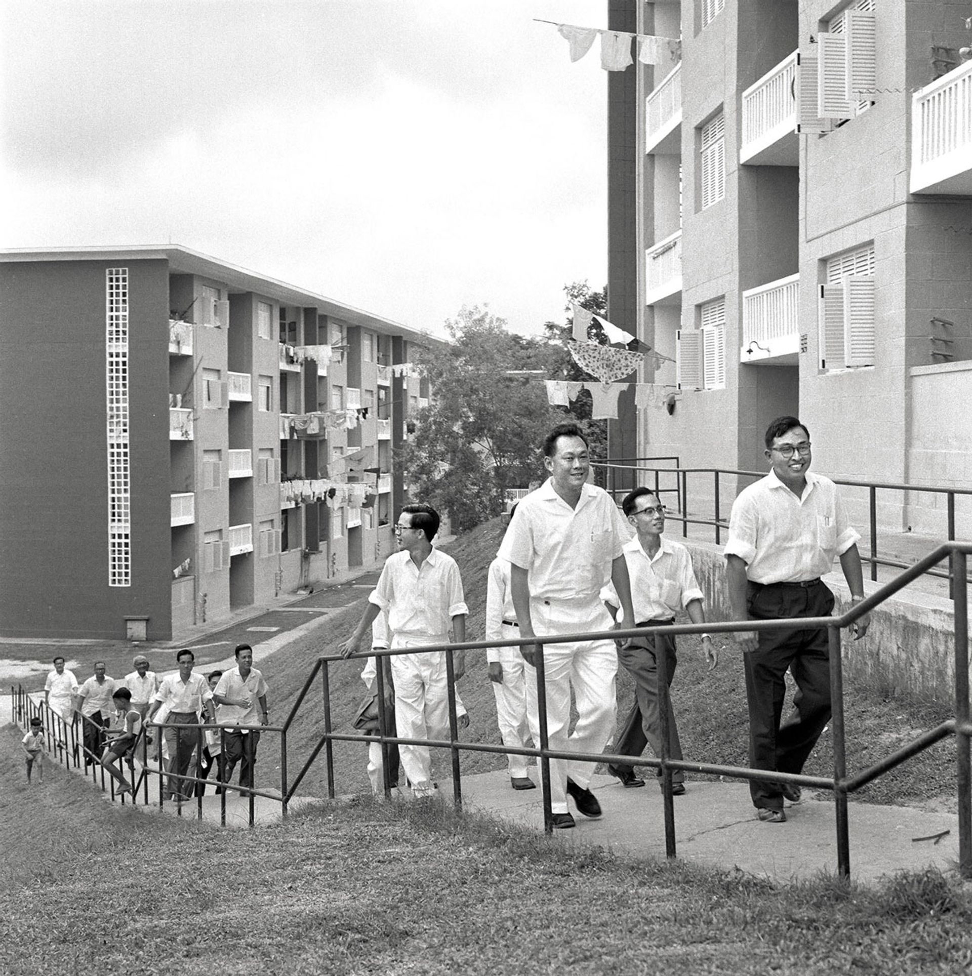 Mr Lee (third from right) inspecting a cluster of Singapore Improvement Trust (SIT) flats near Upper Queenstown on Sept 18, 1959. With him are National Development Minister Ong Eng Guan (behind Mr Lee) and Mr Teh Cheang Wan (right), an architect with SIT who became chief architect with the newly formed Housing and Development Board in October 1959. Mr Lee’s vision then was to provide all Singaporeans with a home to call their own. ST Photo: Chew Boon Chin