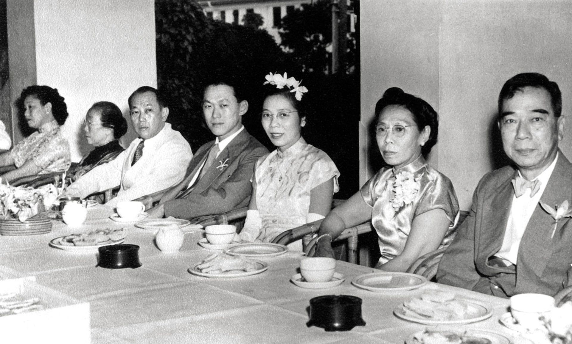The reception of Mr Lee and Ms Kwa’s (fourth and fifth from left) official wedding at Raffles Hotel on Sept 30, 1950. (From left) Mr Lee’s mother Chua Jim Neo, paternal grandmother Ko Liem Nio, Mr Lee’s father Lee Chin Koon, Mrs Lee’s mother Wee Yew Neo and father Kwa Siew Tee. Mr Lee and Ms Kwa married in secret three years earlier at Stratford-upon-Avon in England on Dec 23, 1947. Source: Lee Kuan Yew