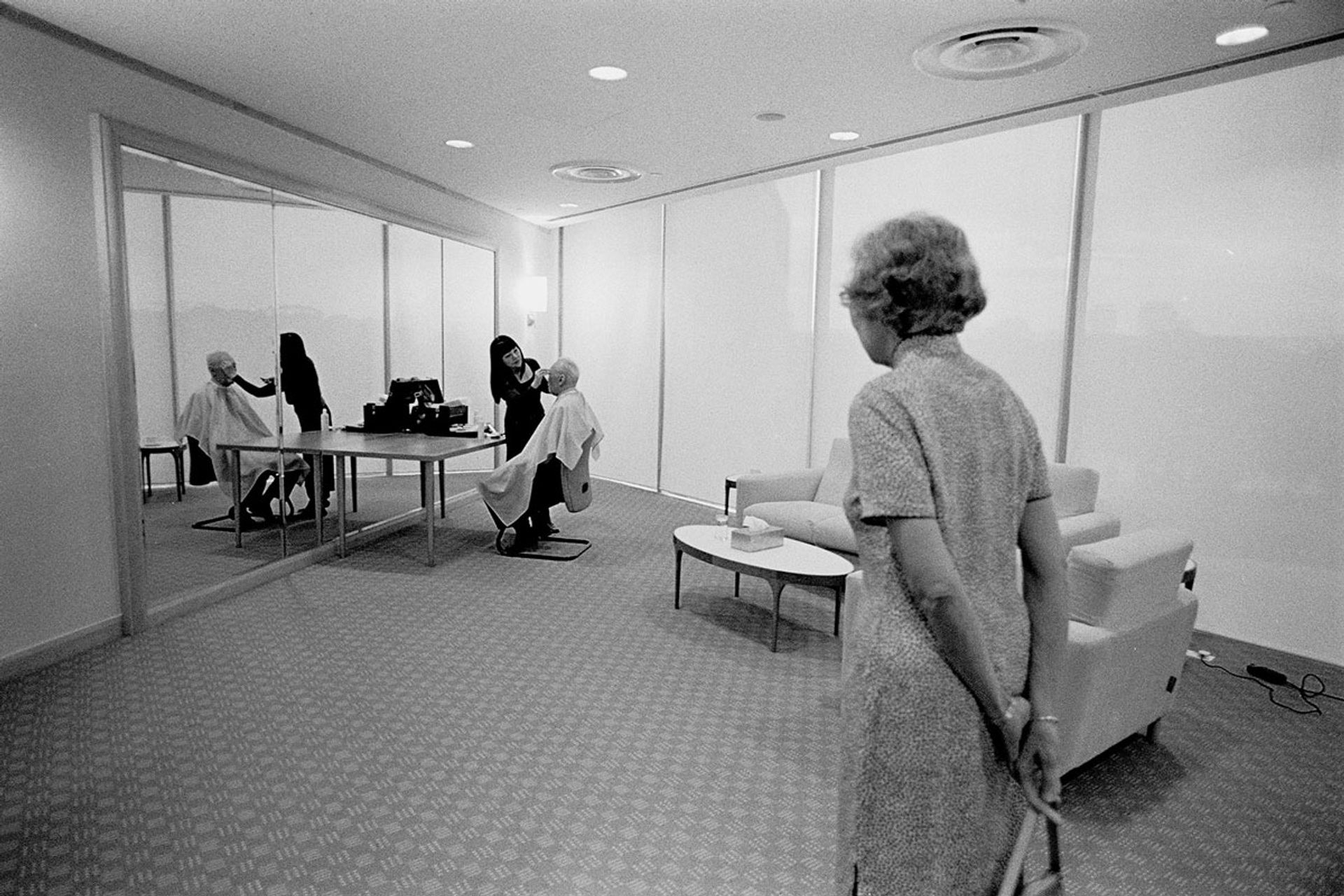 Mrs Lee watching a make-up artist preparing Mr Lee for his public appearance at the 2001 National Day Rally at the National University of Singapore’s University Cultural Centre. Known for her attention to detail, Mrs Lee once interrupted the taping of an interview to put her finishing touches on her husband’s hair and make-up. ST Photo: George Gascon