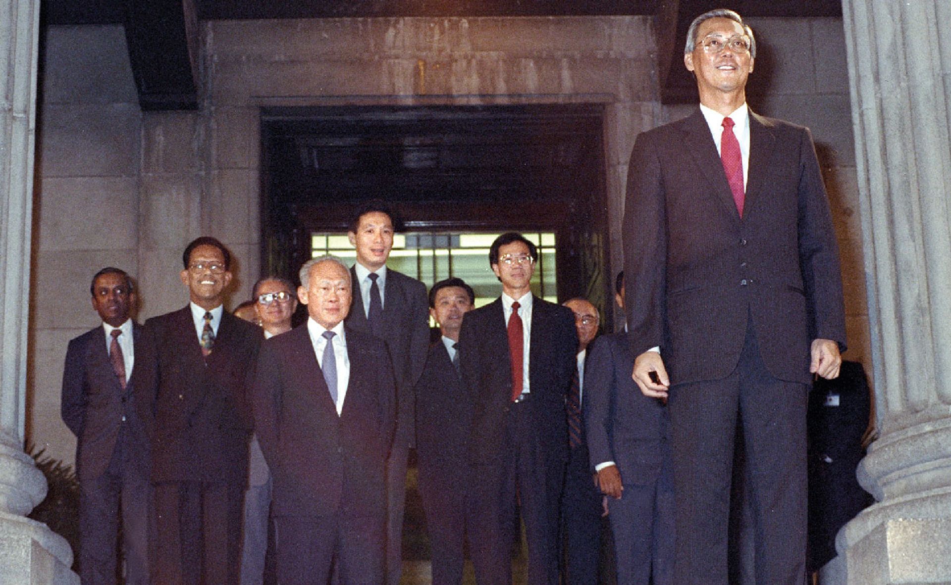 Mr Lee watching as cheering crowds greet his successor, Mr Goh Chok Tong (right), after Mr Goh took his oath of office at City Hall to become Singapore’s second prime minister on Nov 28, 1990. Mr Lee remained in Cabinet as Senior Minister. Political renewal was a key task that Mr Lee had set for himself since the early 1970s to ensure a smooth, orderly transition to the next generation of leaders. ST Photo: Jacky Ho