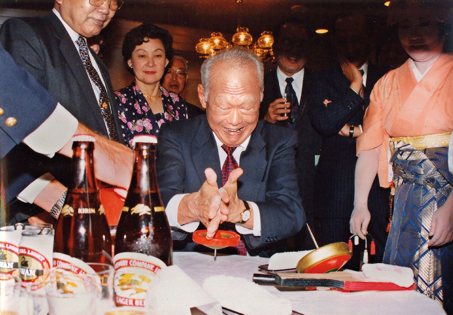 Mr Lee attempting to spin a top in Tokyo in 1993 during an official visit to Japan where he met Prime Minister Yasuhiro Nakasone and his wife Tsutako. The Japanese couple had hosted a dinner at their official residence for Mr and Mrs Lee in Tokyo in October 1986. Source: Lee Kuan Yew