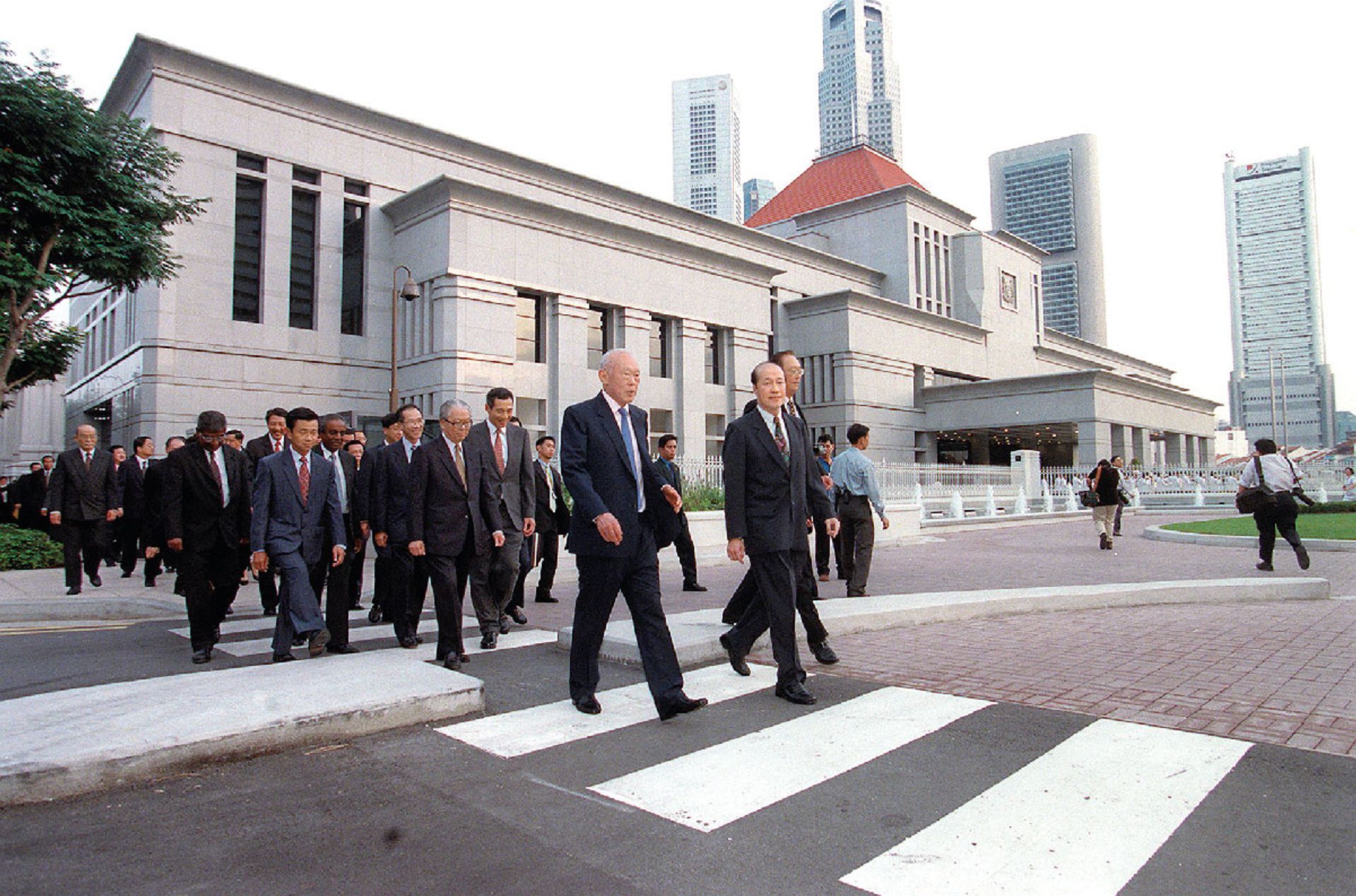 MPs taking a symbolic walk from Old Parliament House to the new Parliament building next door. ST Photo: Jerome Ming