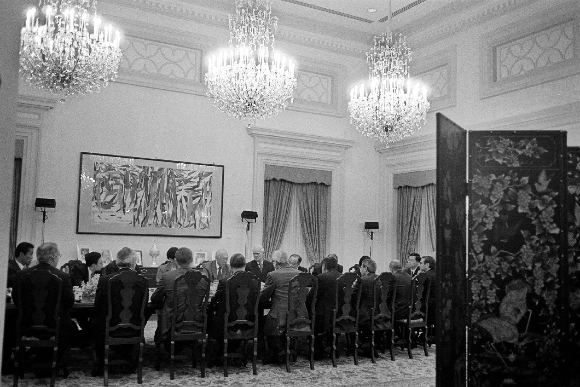 After stepping down as prime minister, Mr Lee continued to work at the Istana, where he held meetings in his office, among other rooms, and received foreign dignitaries and officials. In this photo, Mr Lee is meeting the board of Standard Chartered Bank at the Sheares Room in 2001. ST Photo: George Gascon