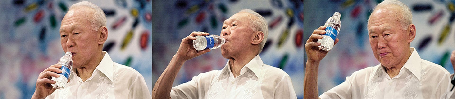 Mr Lee drinking Newater at a National Day dinner on Aug 16, 2002, to help Singaporeans overcome their psychological barrier against the purified used water product. ST Photos: Thomas White