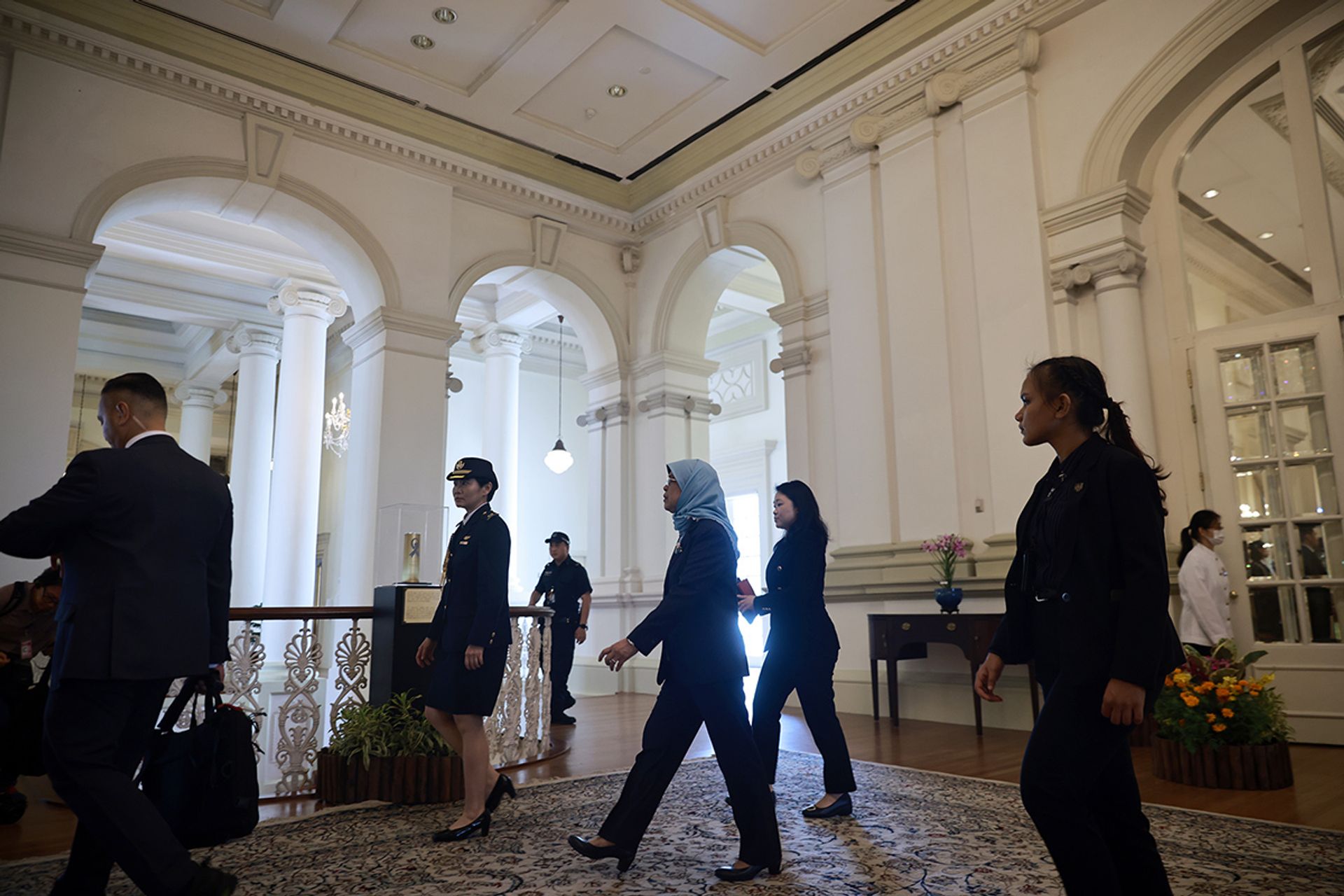 President Halimah walking to an engagement at the Istana on June 5, 2023. ST PHOTO: JASON QUAH