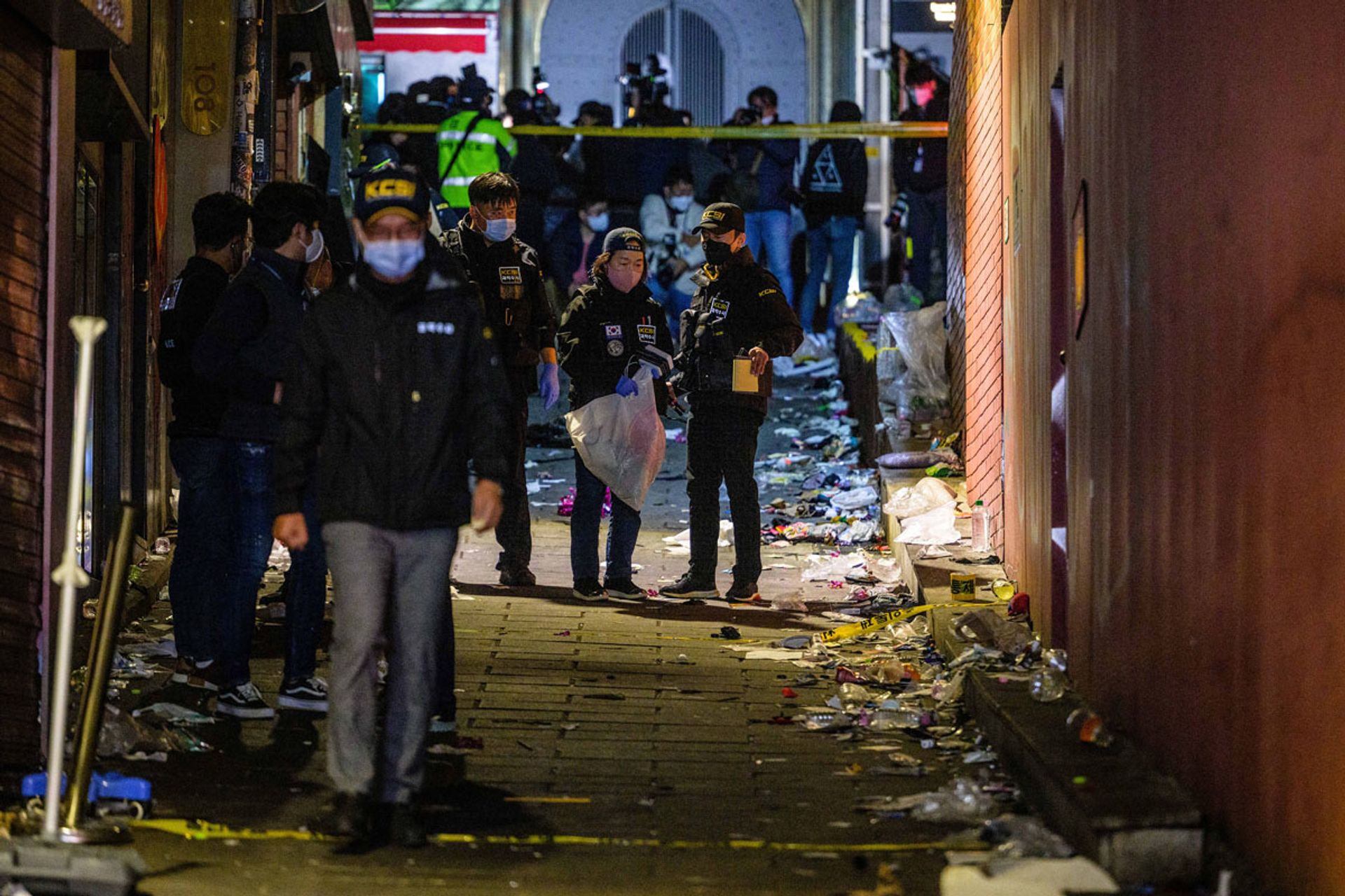 Police crime scene investigators inspecting the alleyway that was the scene of the Halloween crush that left 159 people dead in 2022 in Seoul. PHOTO: AFP