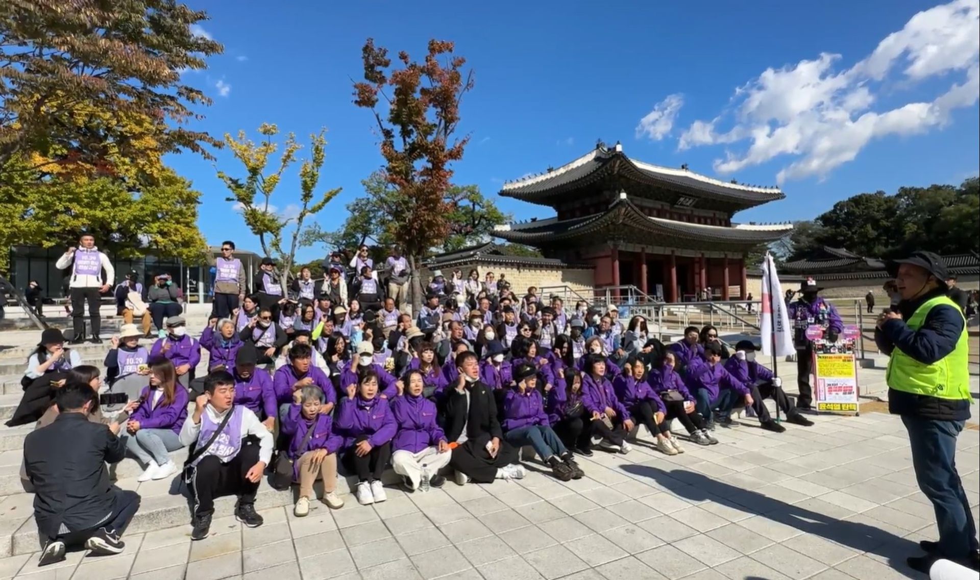Family members of the victims, together with supporters, huddling in front of Changdeokgung Palace on Oct 21 after a march from City Hall to raise awareness about their call for accountability for the Itaewon crowd crush. PHOTO: WENDY TEO