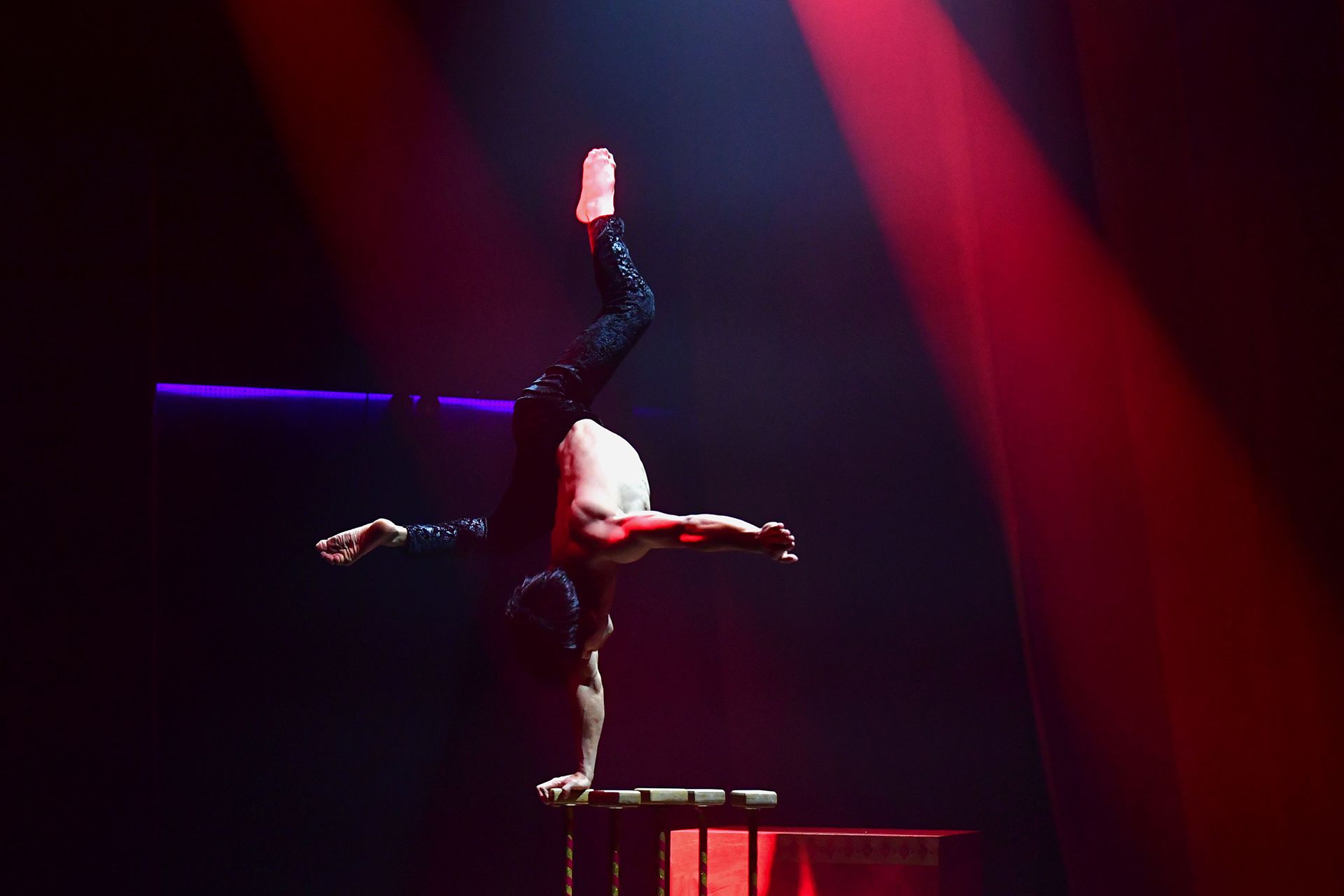 Mr Foo performing his trademark move, a one-arm handstand.