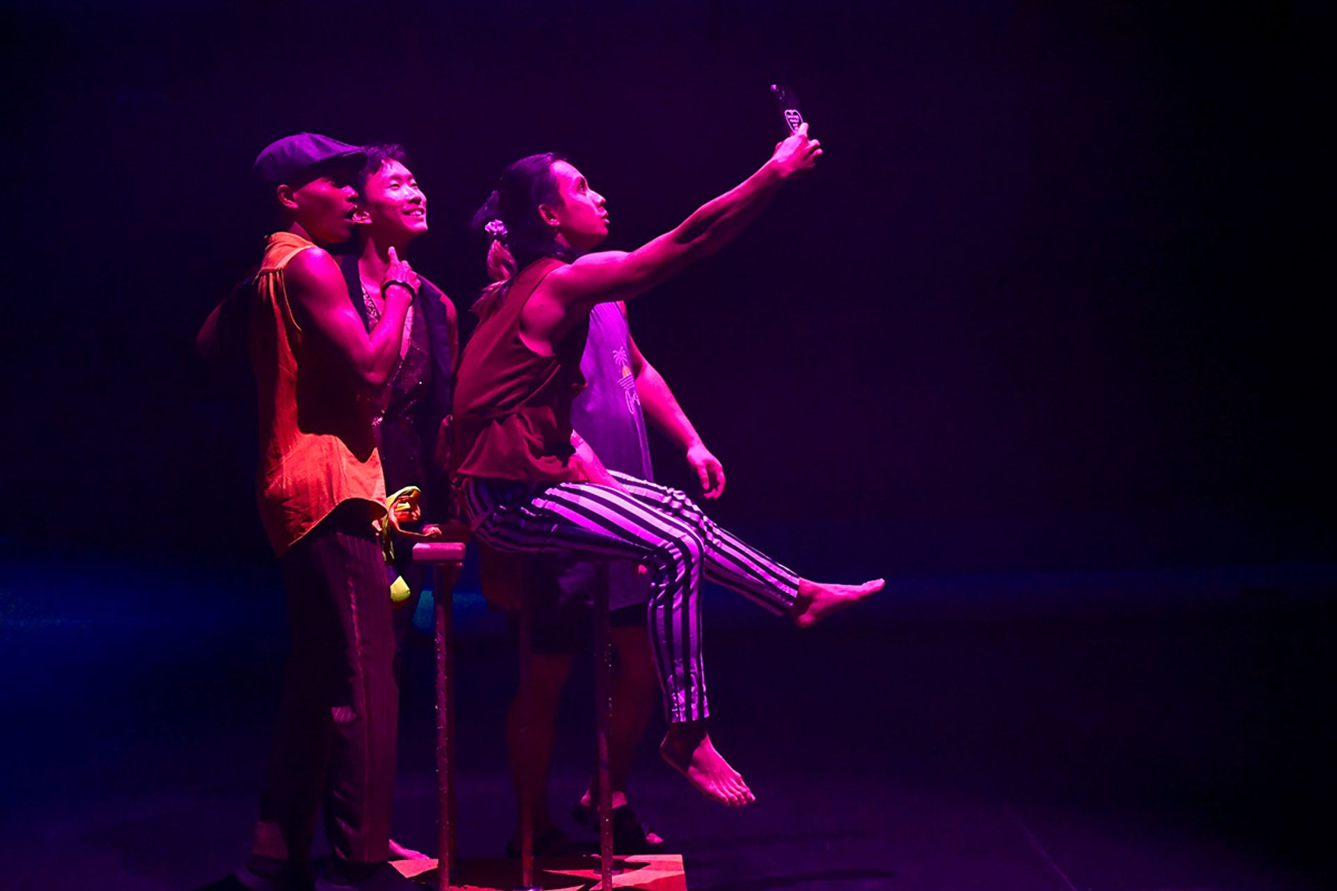 Mr Koh Jia Sheng taking a wefie with (from left) Mr Haphiz Nasrudin, Mr Kang Wee and Mr Joel Chin (partially blocked) after a rehearsal.