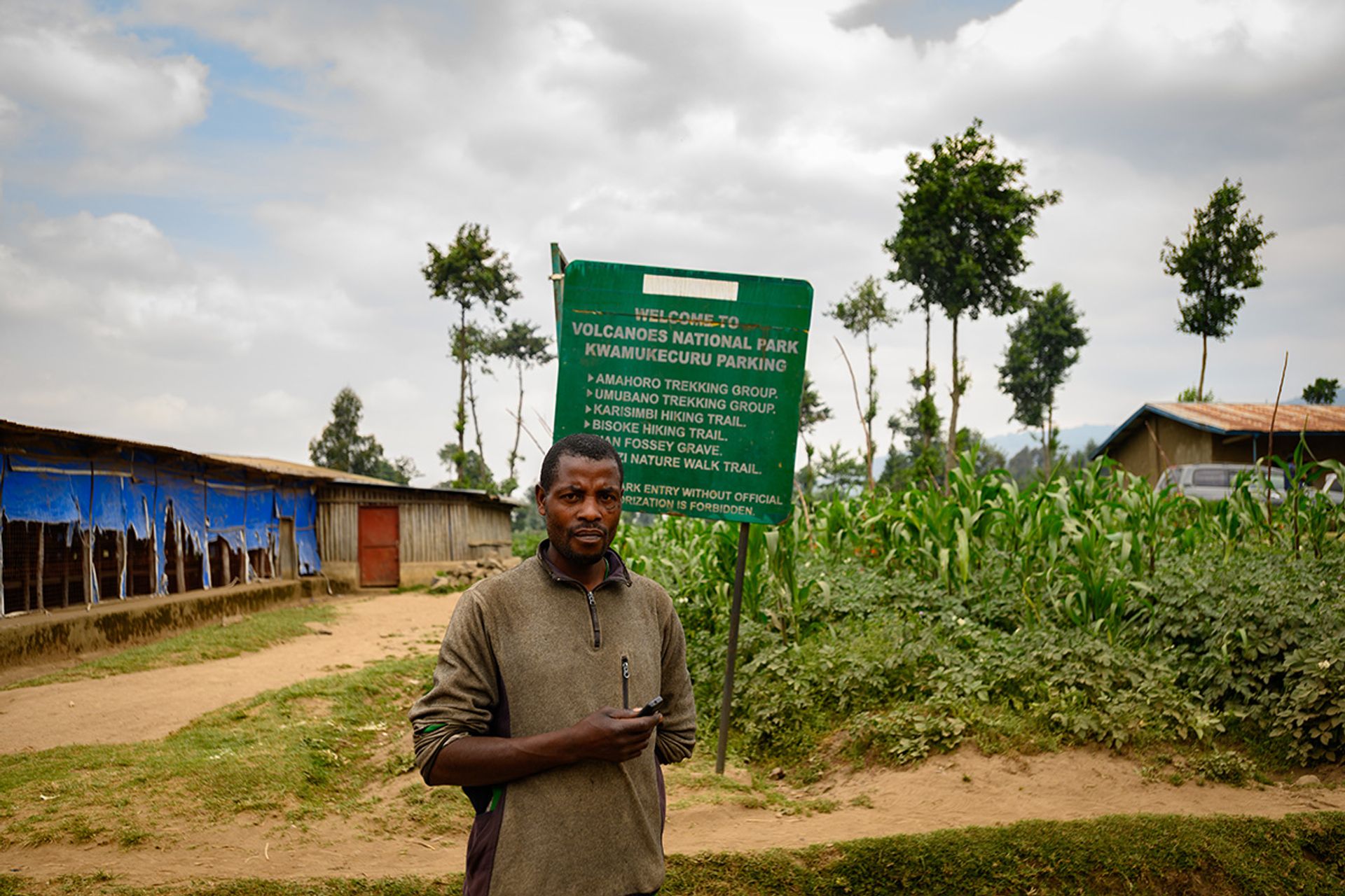 The entrance to Volcanoes National Park. Park visitors have to walk nearly two hours from the village centre to reach this point.