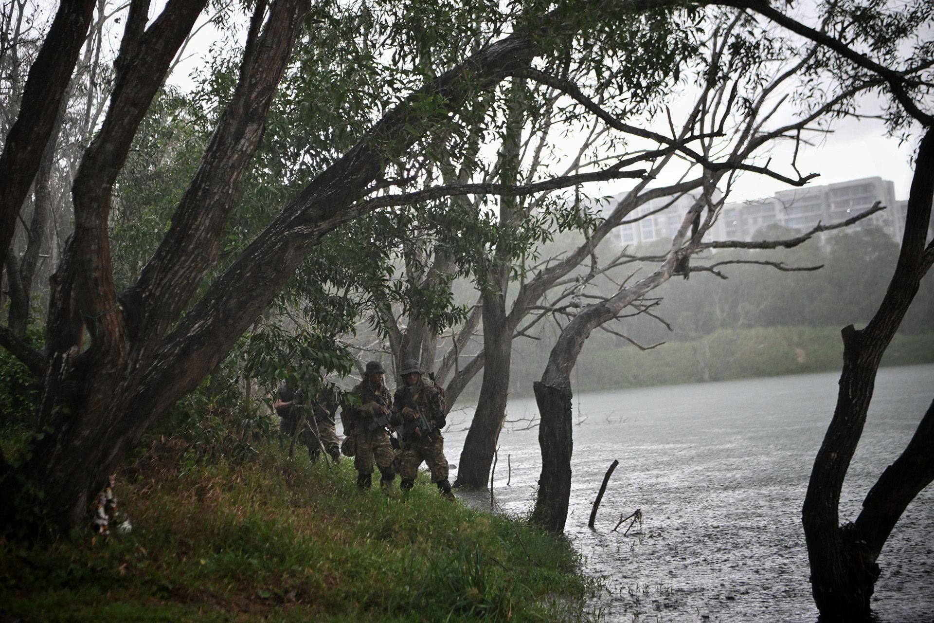 Mr Ahmad Abdullah taking the lead as the family members manoeuvre around a water body, showcasing their coordinated and strategic approach to the terrain.