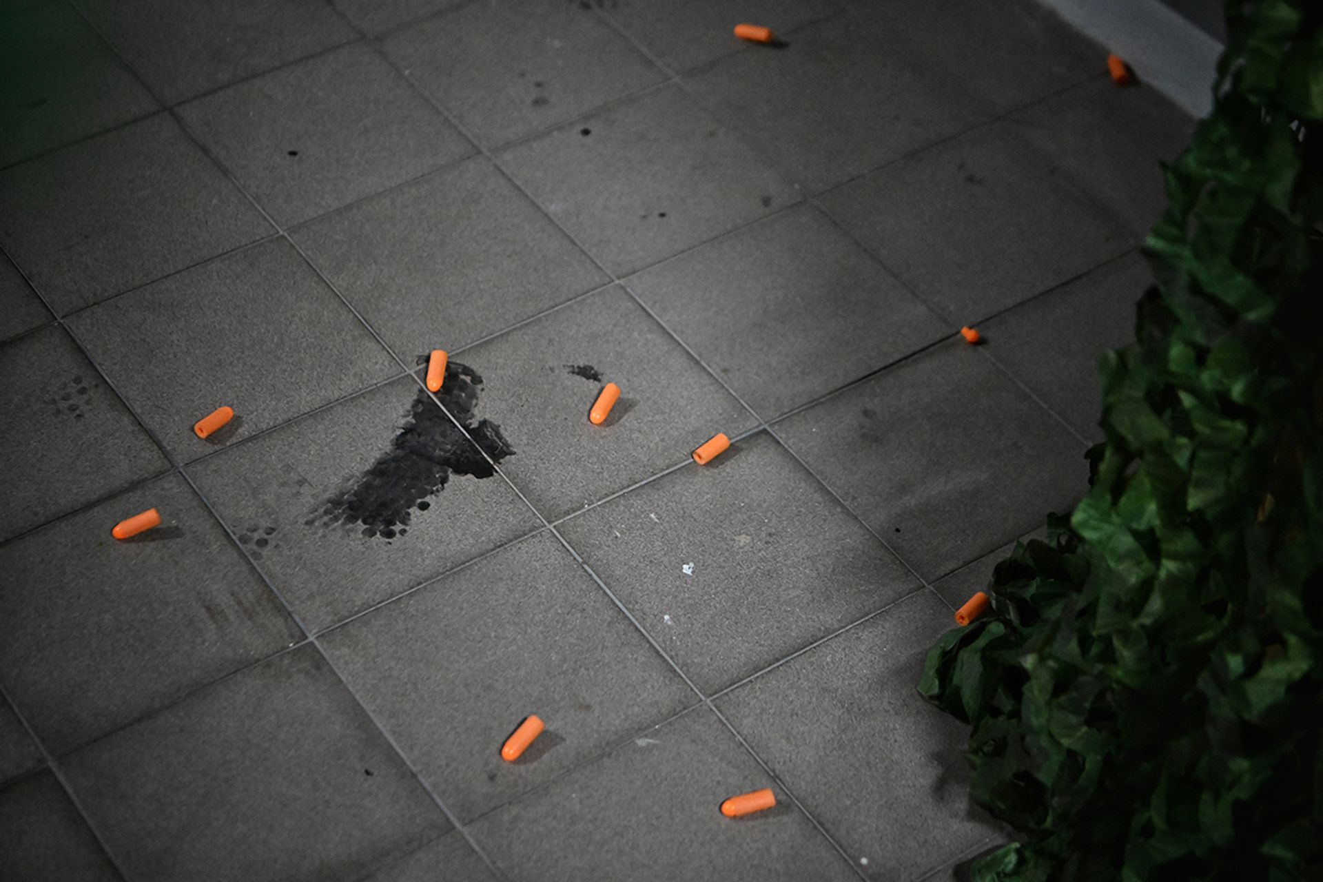 Foam darts seen on the floor during the family’s training.