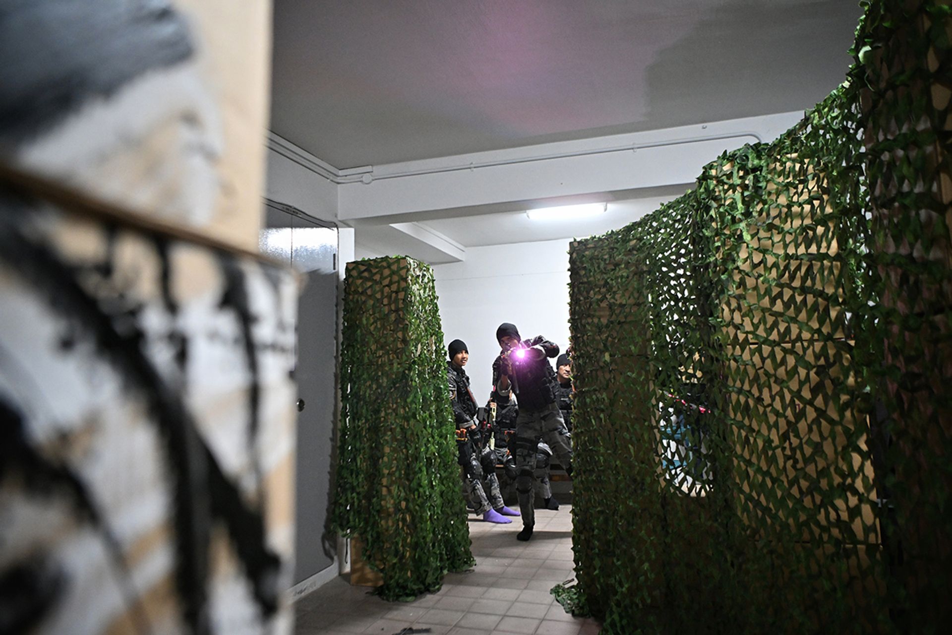 The lift lobby resembling a makeshift set for an action movie.