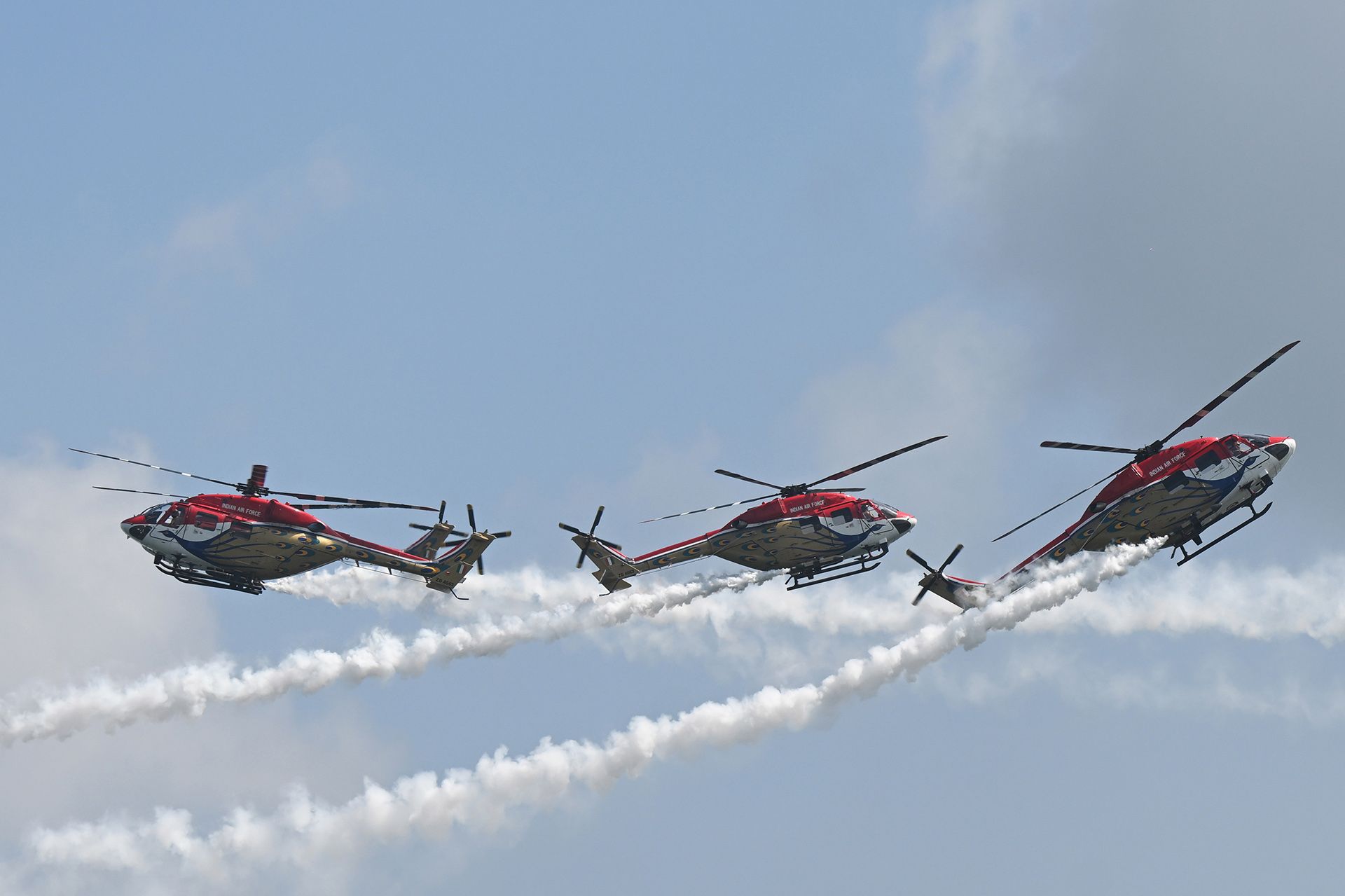 The Sarang Helicopter Display Team is showcasing its aerobatic manoeuvres at the Singapore Airshow for the first time. ST PHOTO: AZMI ATHNI