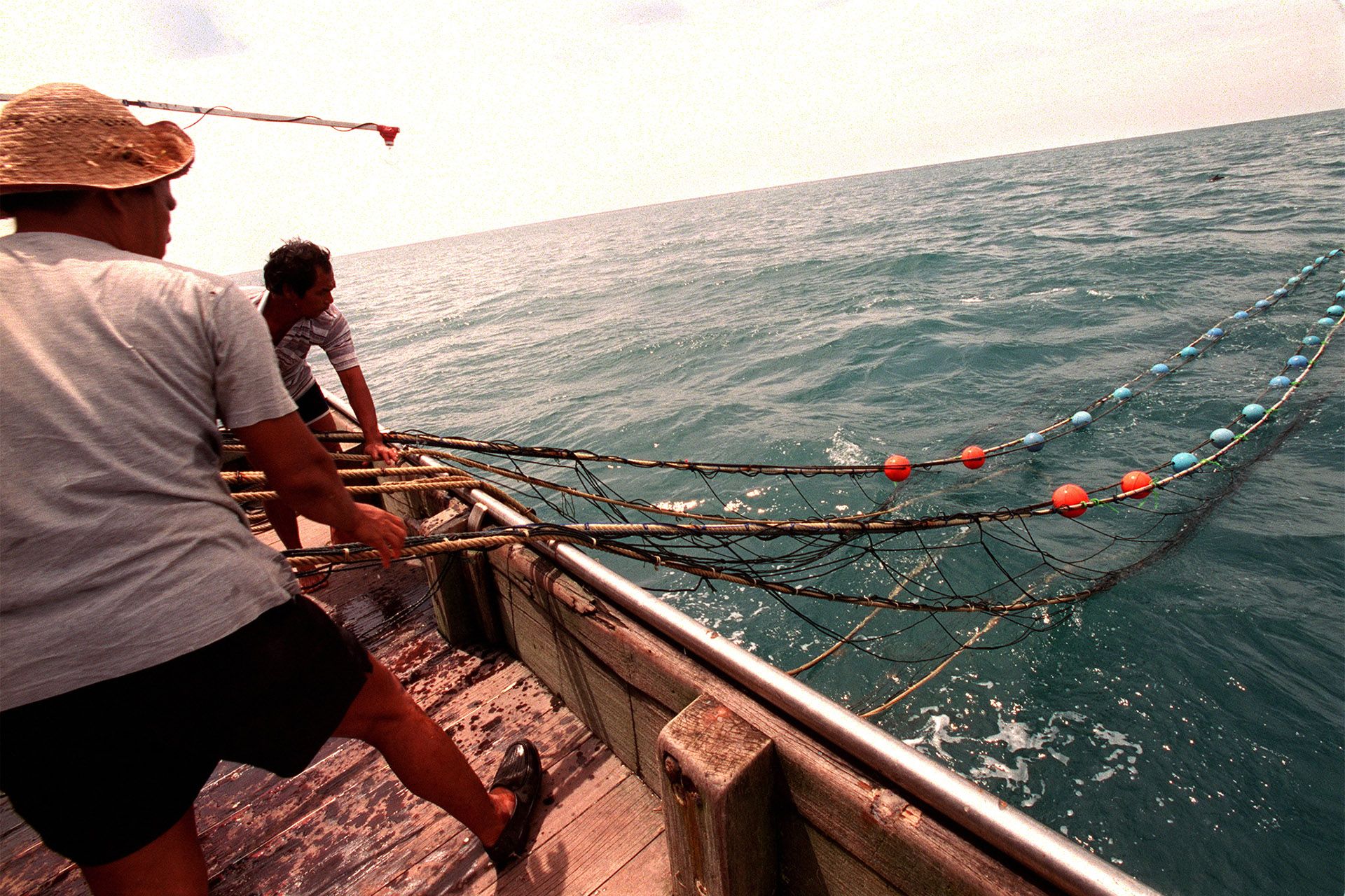 Fishermen would spend about five days in a trawler along the South China Sea, and bring back 2,000kg to 5,000kg of fish to the Senoko jetty to sell. ST FILE PHOTO: CHEW SENG KIM