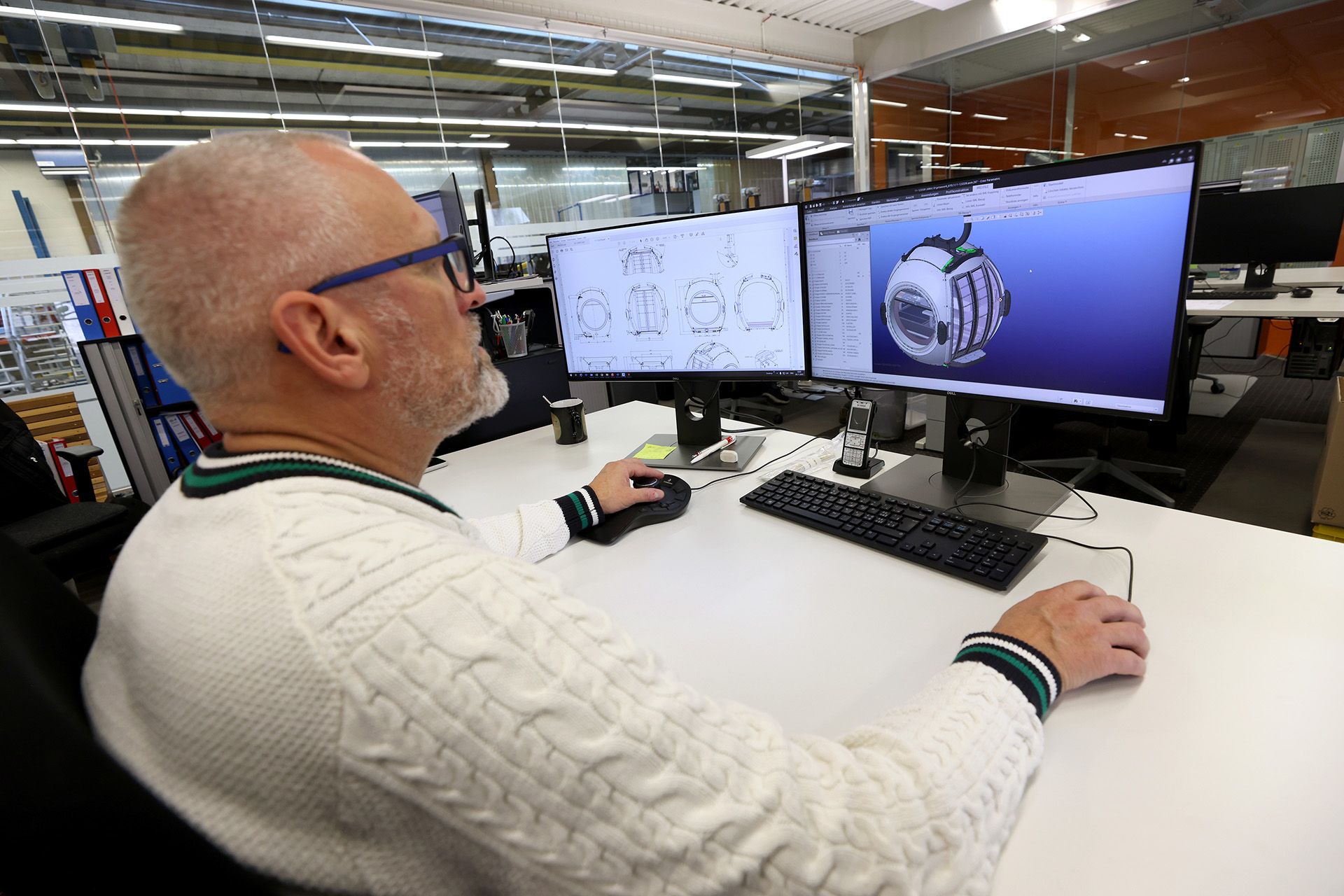 Engineer Norbert Lassig  looking at the 3D model drawing of the SkyOrb cabin in Olten, Switzerland on Nov 8, 2023.