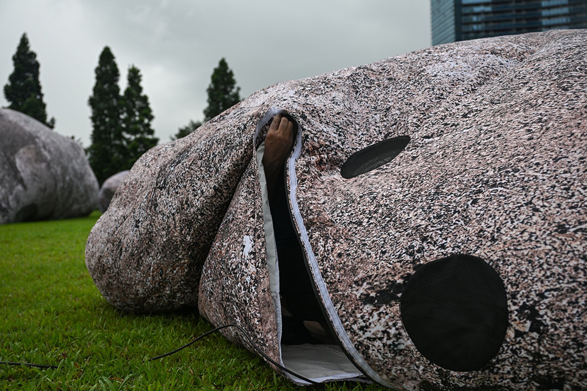 A crew member working on an inflatable aquatic rock, which is part of Iwagumi Air Scape installation, at The Promontory @ Marina Bay on May 25.