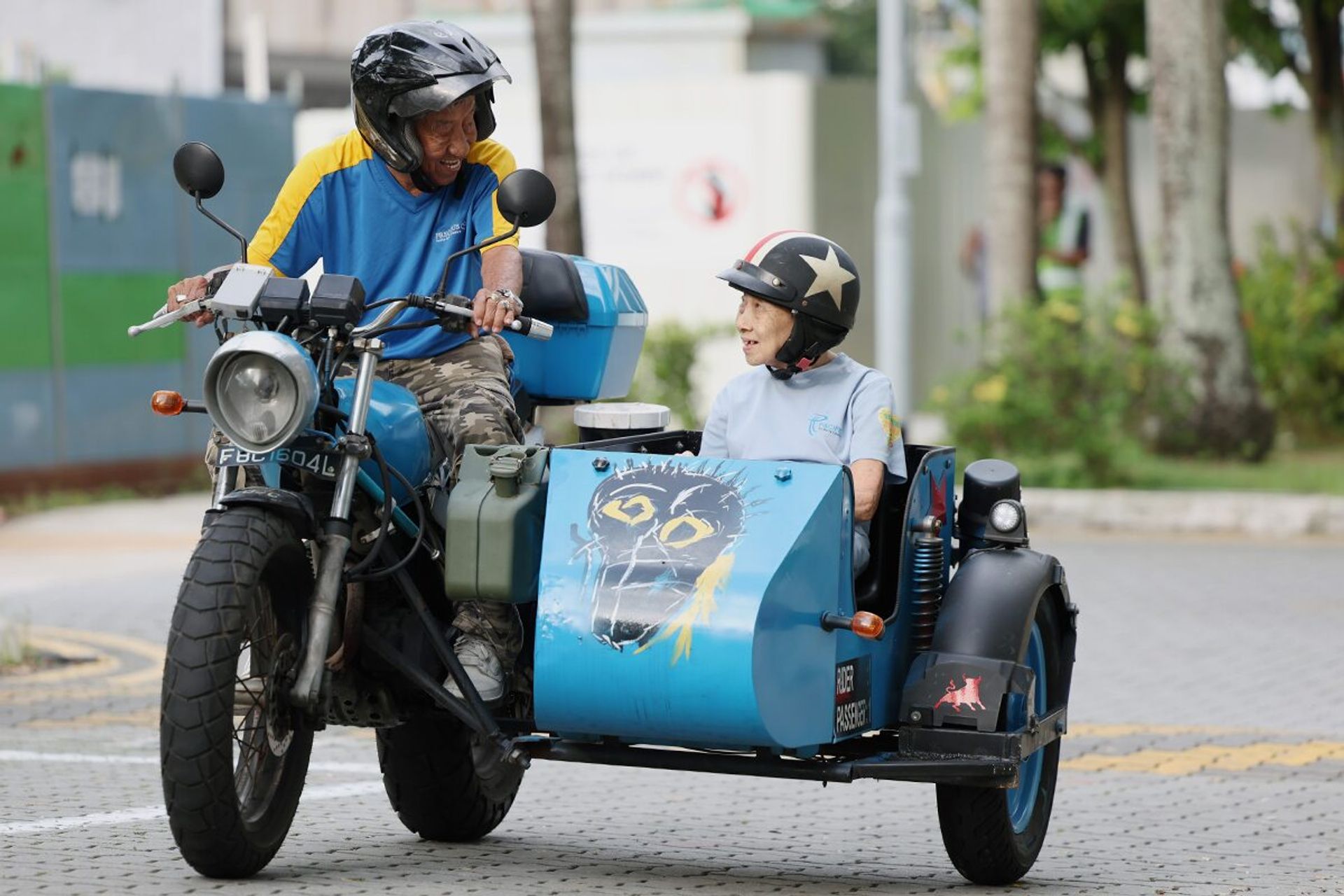 Mr Loke taking a ride with Madam Tong at Punggol Emerald on May 31, 2024.