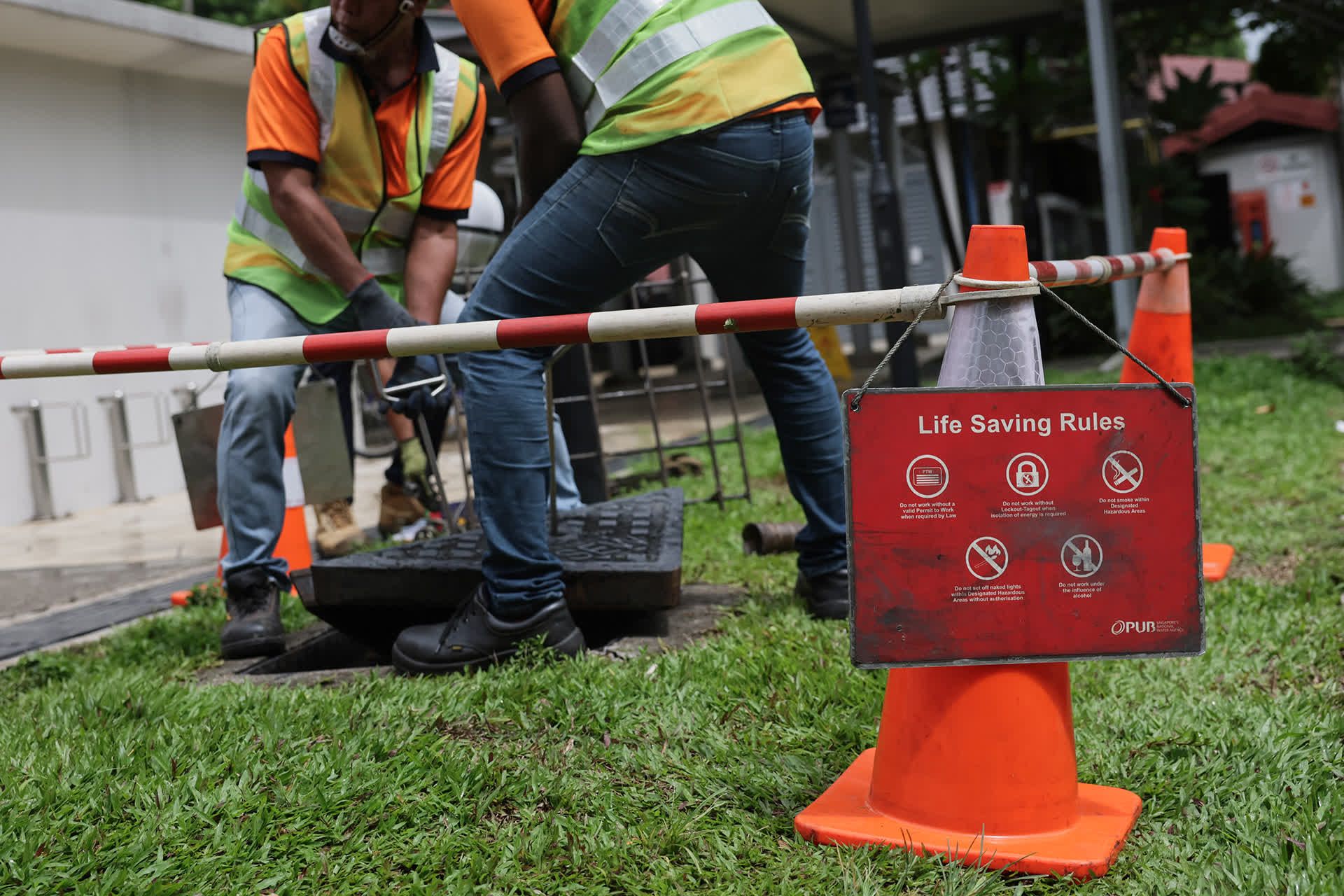 After checking several manholes along the affected sewer line, the team identifies the location of blockage, as the used water flow is observed to be stagnant.