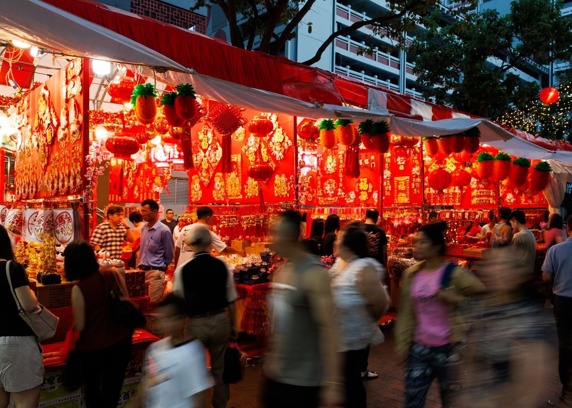 Singapore: Shoppers in Chinatown checking out the vibrant Chinese New Year decorations ahead of the festival.