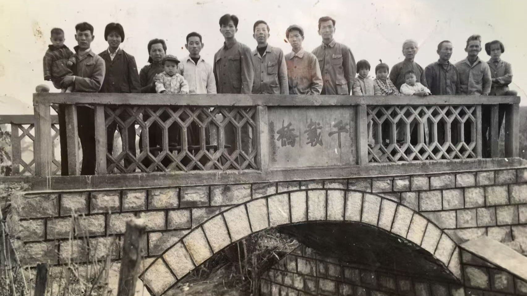 Mr Lee visited his ancestral village with a 1982 photo of a bridge that his grandfather had donated to build.