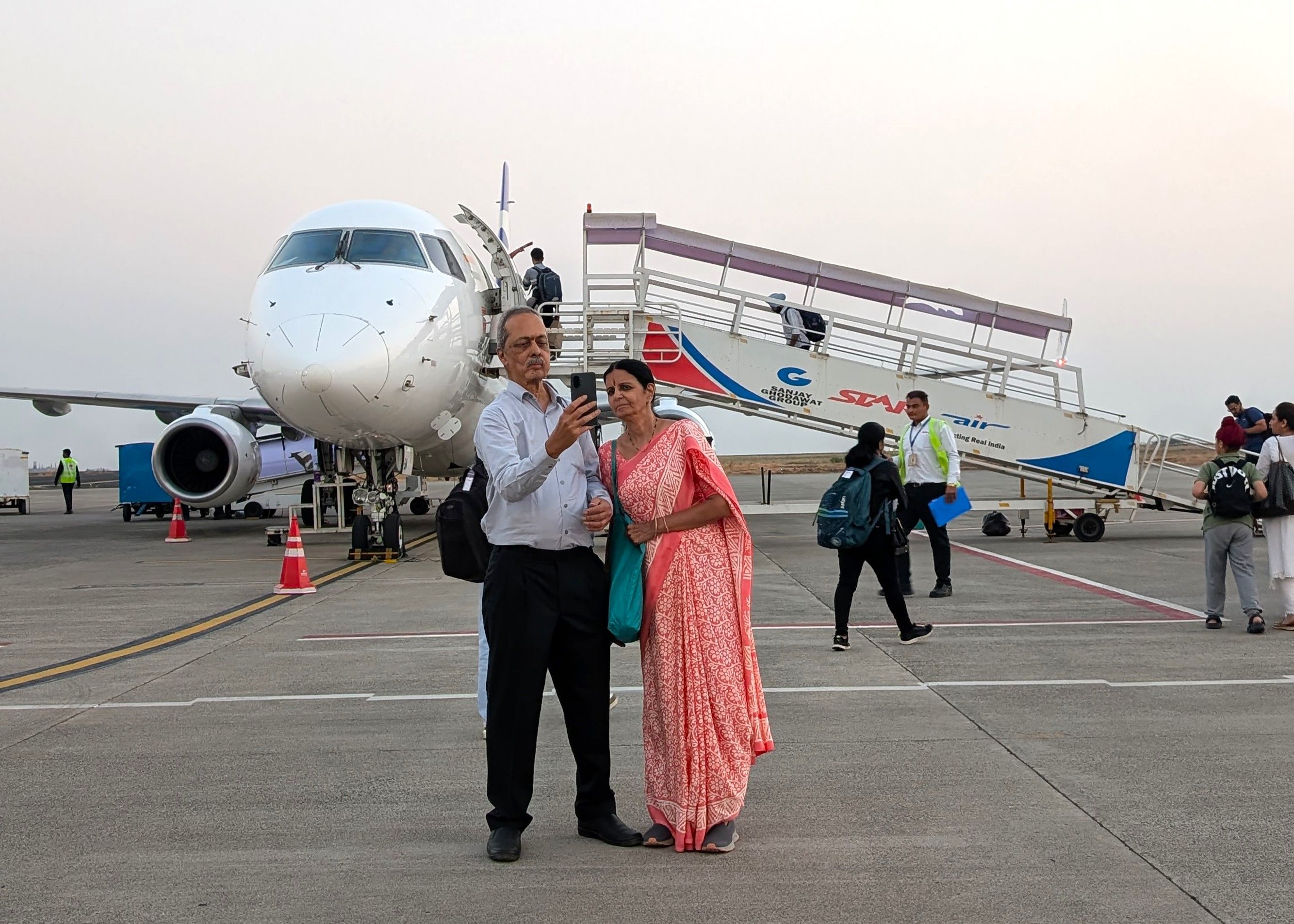 An elderly couple take a wefie at the Nanded Airport before they take a flight to visit their software engineer son in Bengaluru.