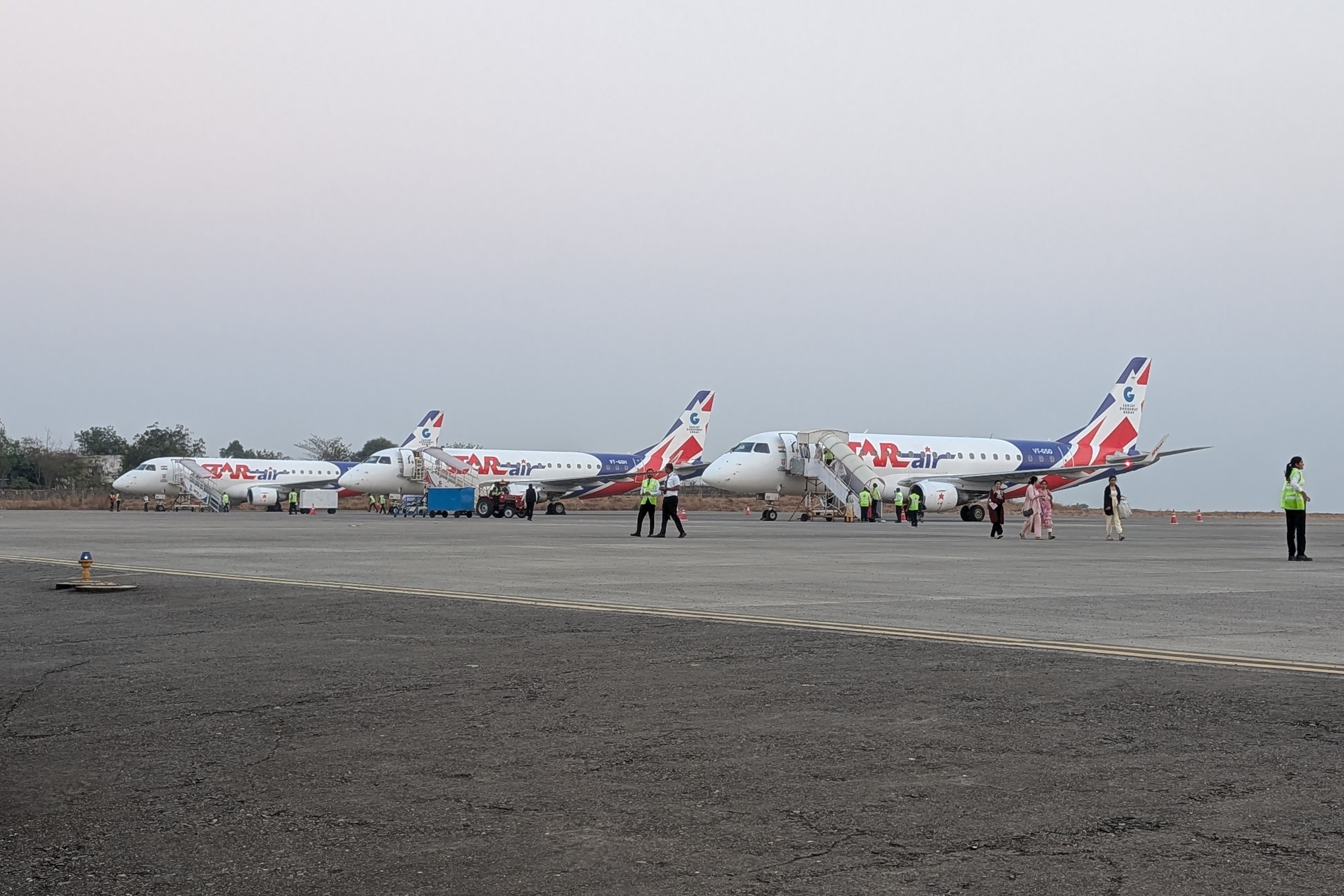 Star Air airplanes sit on the tarmac in the Nanded airport.