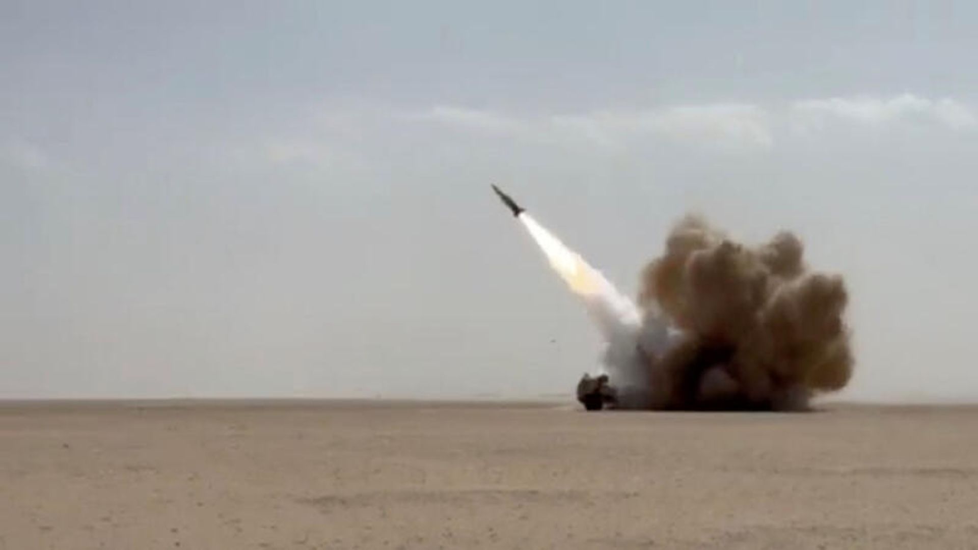 A missile launches from a desert location in a screengrab from a U.S. Central Command video