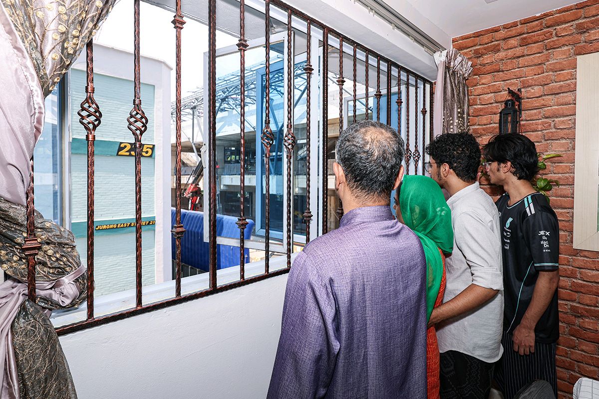 Ameer Kaisar Ali and his family are among residents affected by noise and environmental pollution from ongoing Jurong Region Line construction work outside their home. ST PHOTO: BRIAN TEO