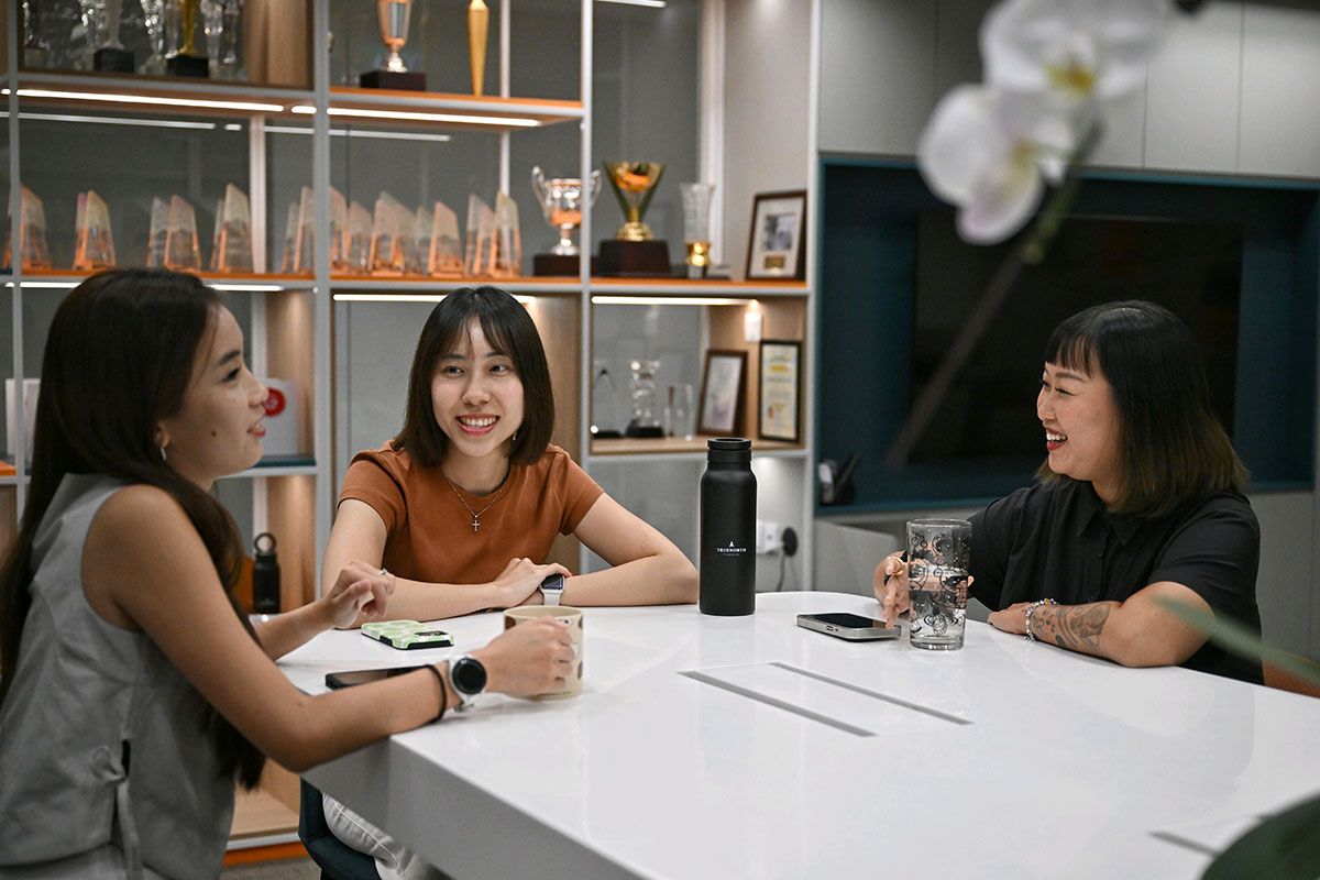 (From left) Financial consultants Rachel Cheang, 28, Christine Ng, 29, and Rachel Tan, 34, at their office in September. ST PHOTO: ARIFFIN JAMAR