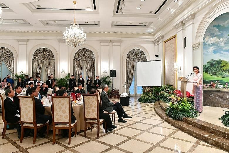 Ms Suu Kyi speaking at the dinner hosted by PM Lee at the Istana last night. She said her country is happy to learn from Singapore ways to control corruption and impart skill training to young workers. She added that she believes her country can over